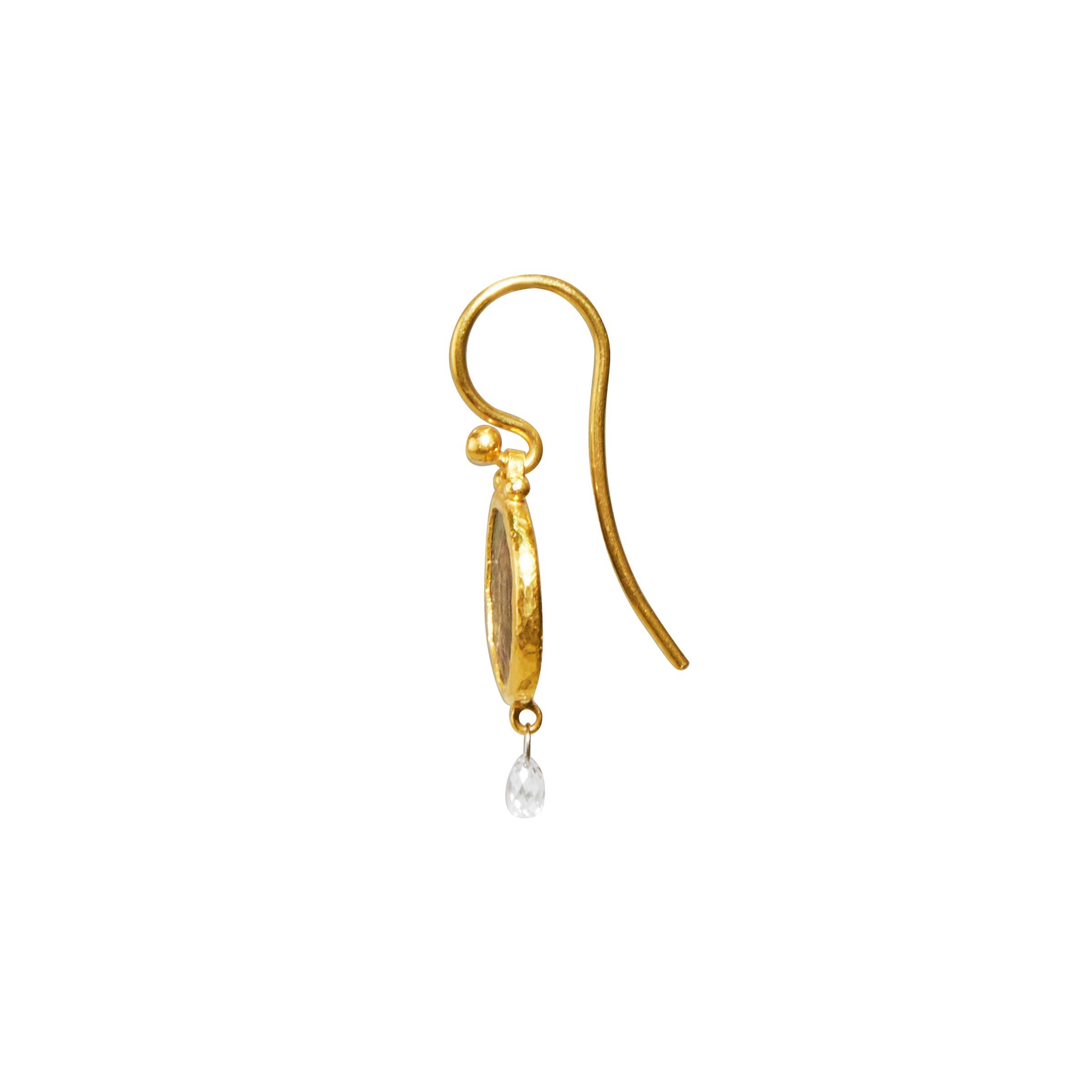 GURHAN one-of-a-kind drop earrings in 24 Karat hammered yellow gold featuring 10mm roman imperial coins with white diamond briolettes, 0.30cts. 1.20” total length with 18 Karat yellow gold ear wires accented with gold granulations.