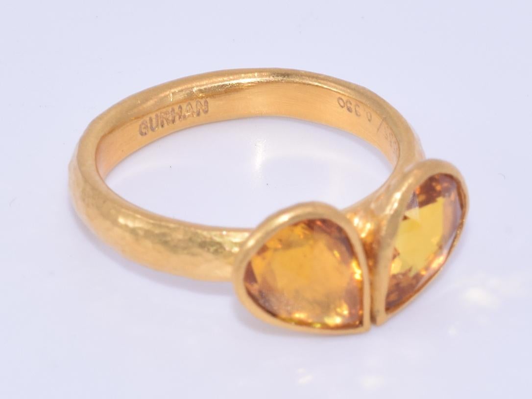 Pear shape rose cut citrines are set in closed back 24 karat yellow gold, signed Gurhan, RA00585/0.990. Ring size 6.75.