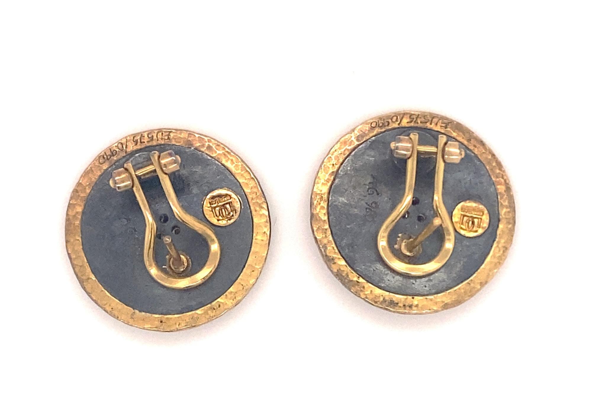 This is a beautiful pair of Gurhan designer earrings with blackened sterling silver, 24K yellow gold and diamonds. This is the Imperial Disc pattern. The earrings are marked eu575/ .990 for fine gold and 925 Gurhan. The six round diamonds are H