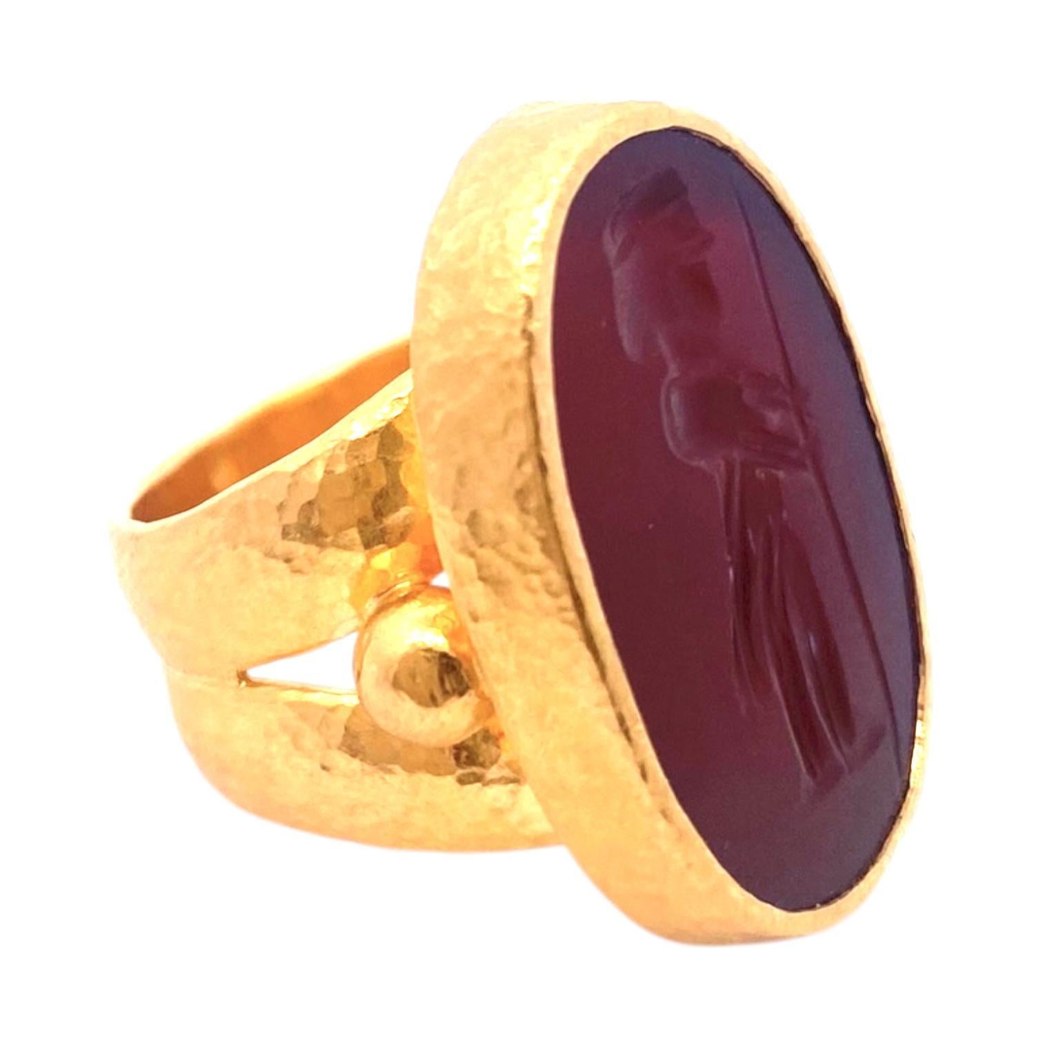 GURHAN large intaglio signet ring from the Antiquities Collection. Handcrafted in 24K yellow gold with hammered finish, this ring features a striking oval carnelian intaglio amulet with a closed back. 
Measurements:
Front: 29.5 mm L x 19.5 mm W x 5