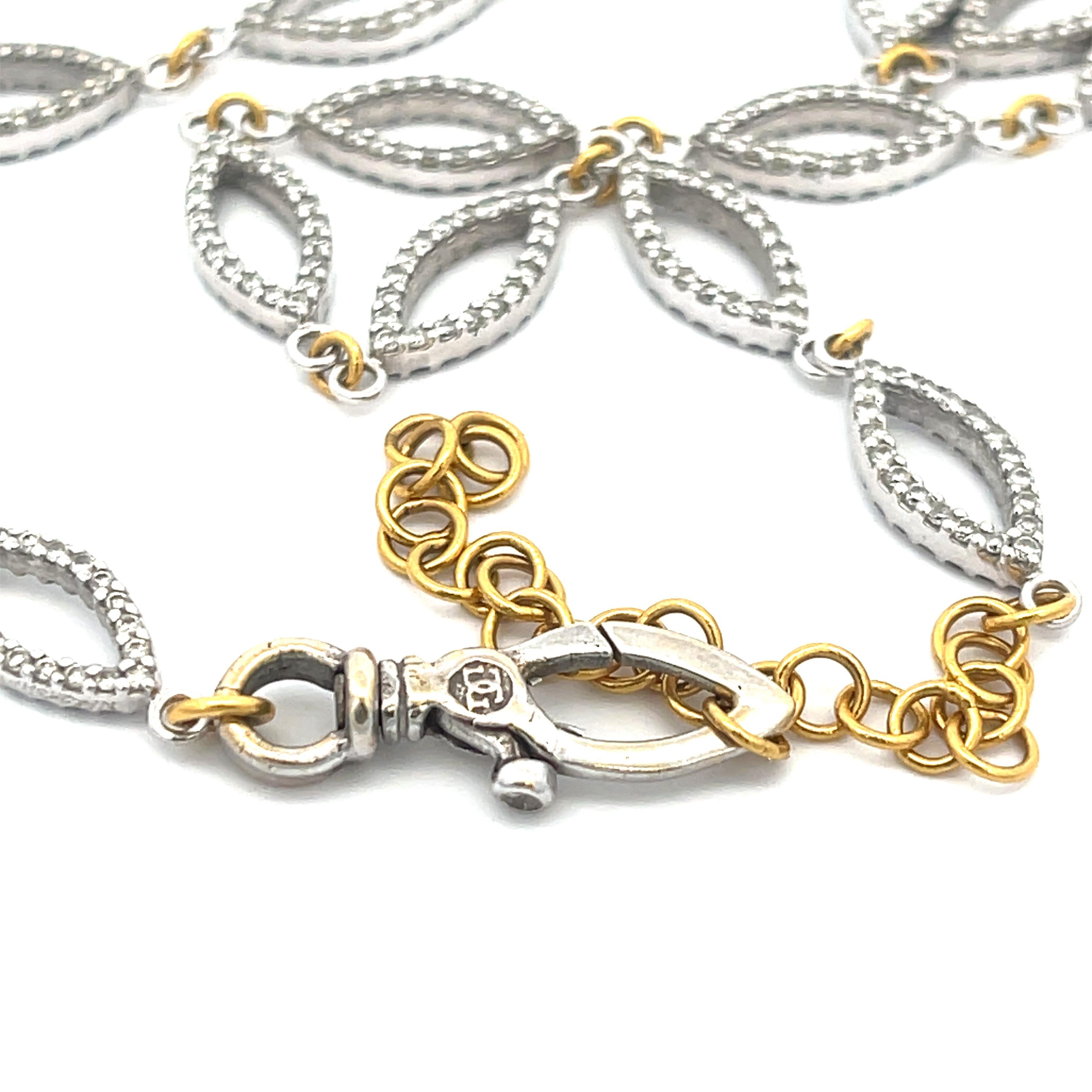 Collier en or blanc 18 carats et or jaune 24 carats avec diamant Gurhan 1,75ctw. Pièce rare.
Réglable de 18,5 à 21 pouces
21.58 Grammes