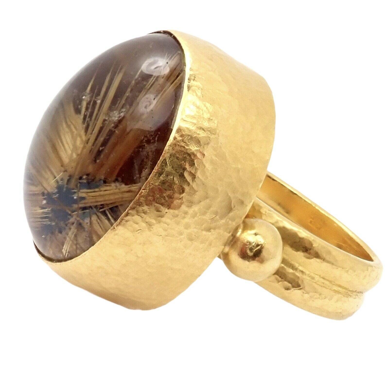 This striking 24k Yellow Gold ring with a large rutilated quartz comes from the legendary GURHAN. 
With 1 Large Rutilated Quartz - 21mm x 18mm
Measurements: 
Size: 6
Weight:  21.5 grams
Width: 23mm
Stamped Hallmarks: Gurhan .990 xxxxx(serial