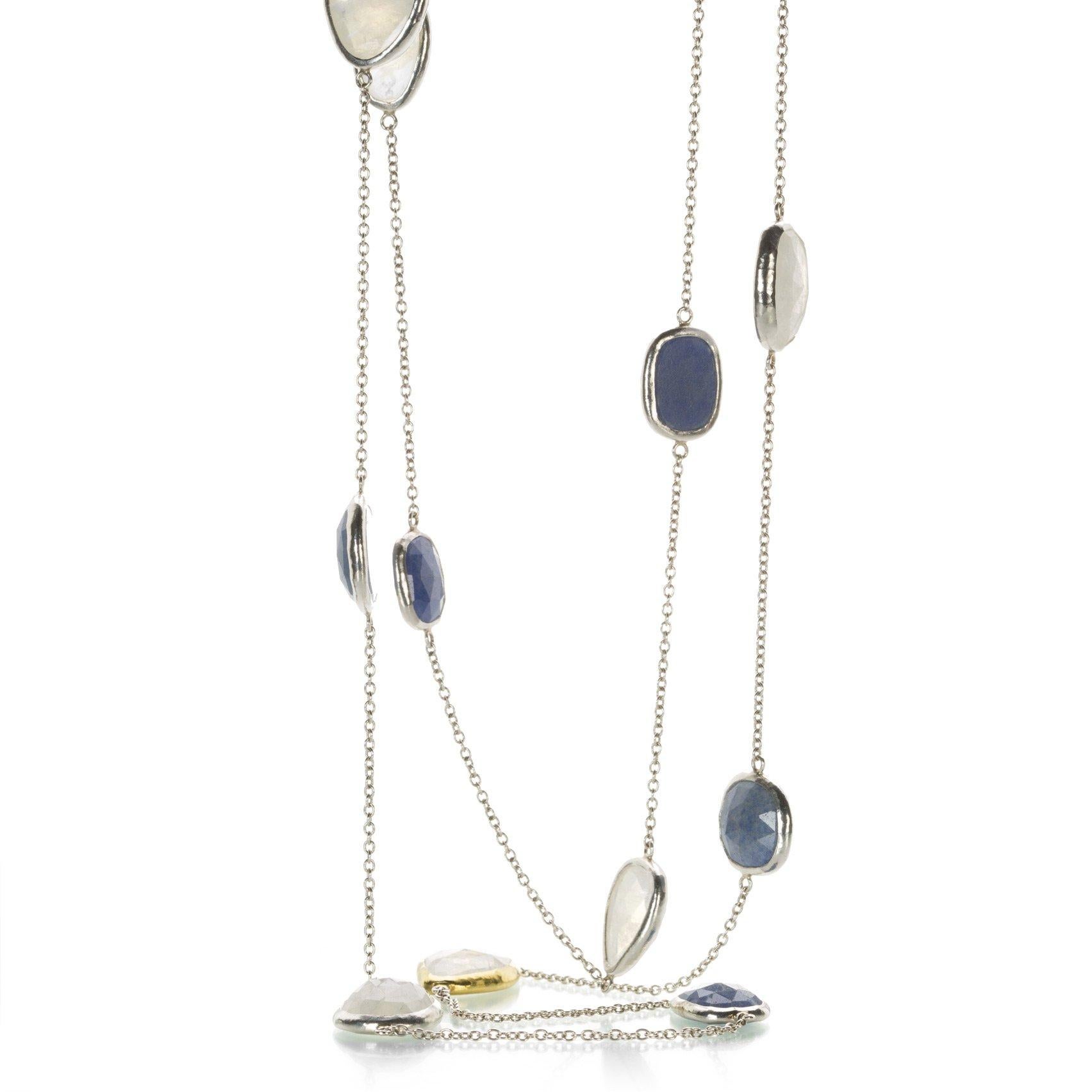 One-of-a-kind station necklace in sterling silver layered with 24K gold featuring (14) mixed sized amorphous rose-cut Galapagos White Moonstones and Blue Quartz. Made in Italy. 45