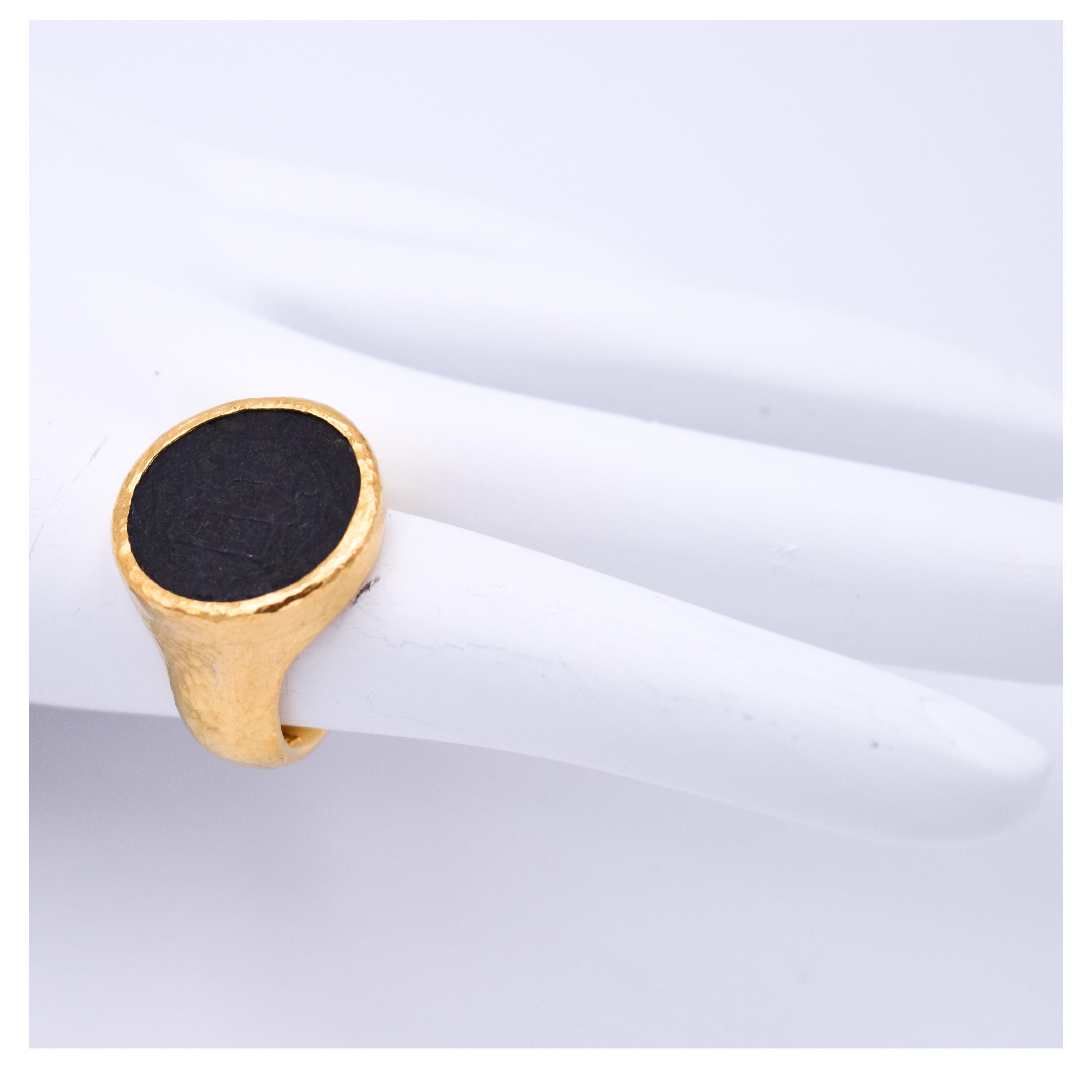 From Gurhan’s remarkable collection of handmade 24k gold treasures, inspired by the sensuality of pure gold, each jewel illuminates the golden warmth of the feminine spirit.

One of a kind bronze coin ring in 24k with a wide gold
