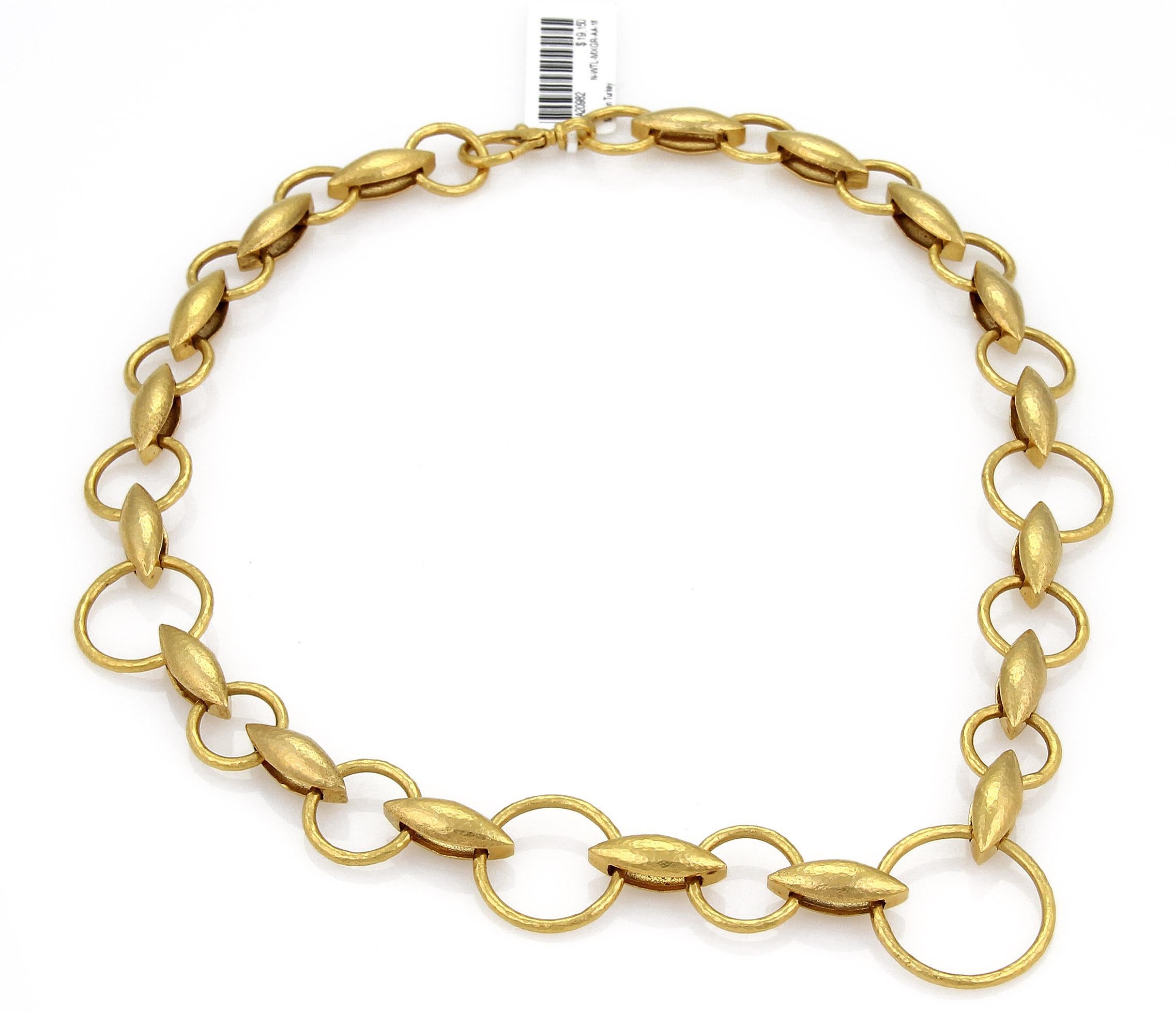 This lovely authentic necklace is by Gurhan from the WHEATLA collection. It is crafted from solid 24k yellow gold in a fine hand hammered finish. There are assorted large, medium and small open round links joined together with a double side wheat