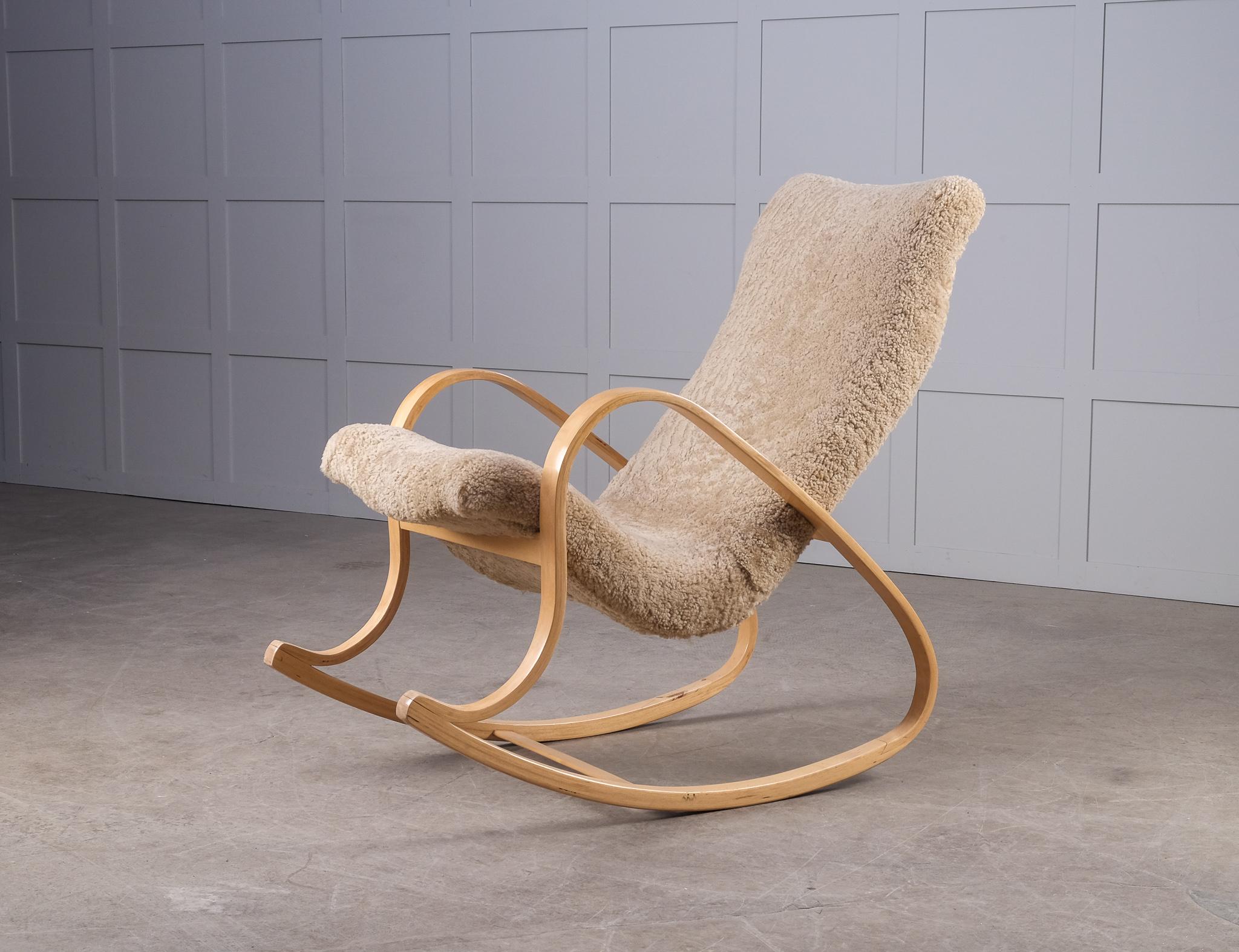Reupholstered in honey colored sheepskin. Produced in Sweden by Väsby Möbel, 1950s.
This model is represented at Museum of Modern Art in New York.