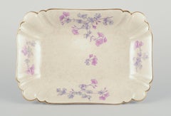 Gustafsberg, Sweden. Two oblong and deep "Geranium" faience dishes.