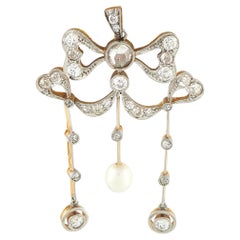 Pendentif Gustav Dahlgren en or rose 18 carats et argent, serti de diamants (1,10 ct) et de perles