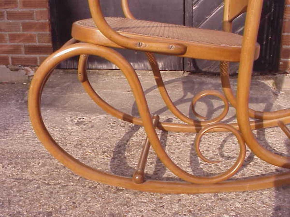 Early 20th Century Gustav Siegel Attributed, Made by Thonet, a Bentwood & Cane Rocking Chair For Sale