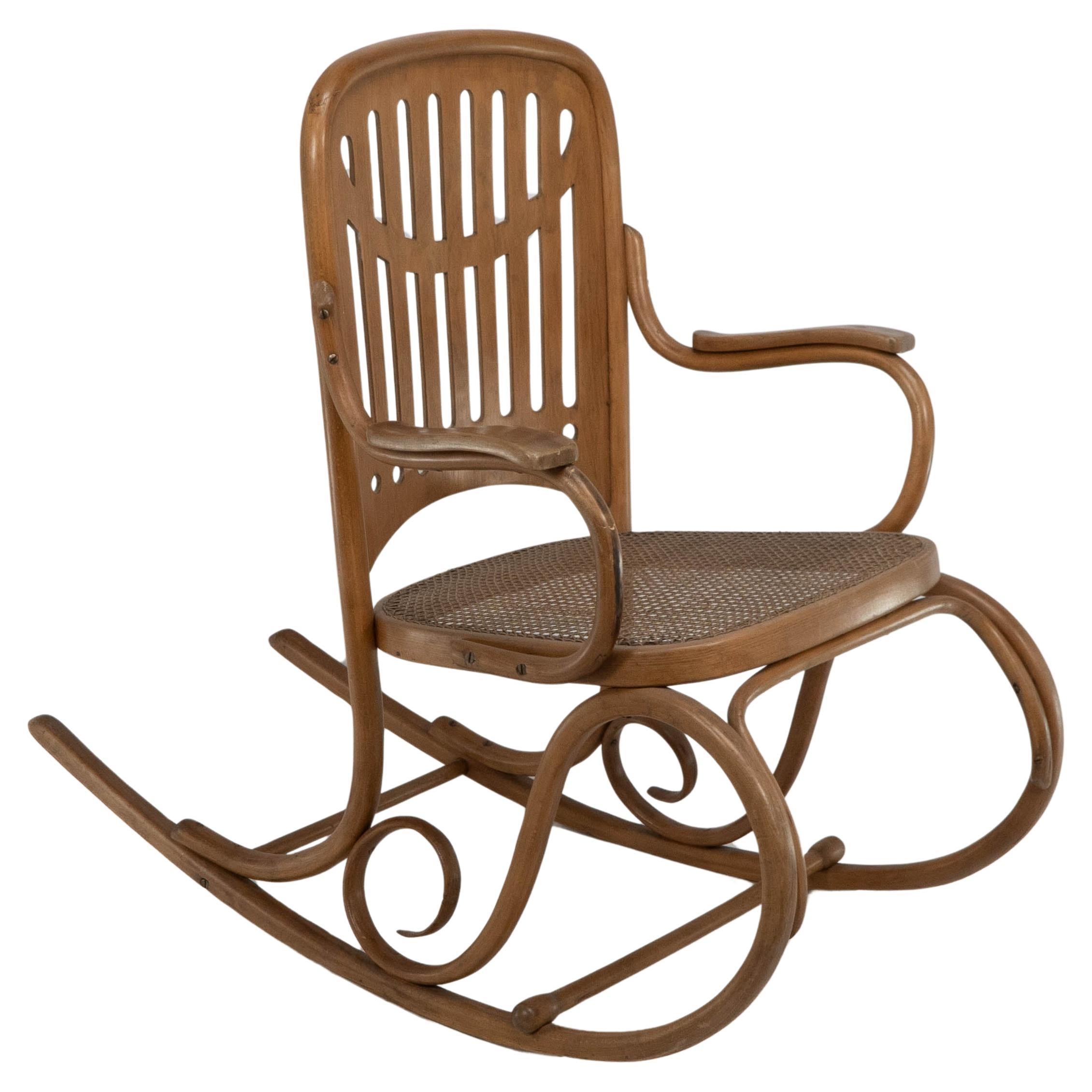 Gustav Siegel Attributed, Made by Thonet, a Bentwood & Cane Rocking Chair