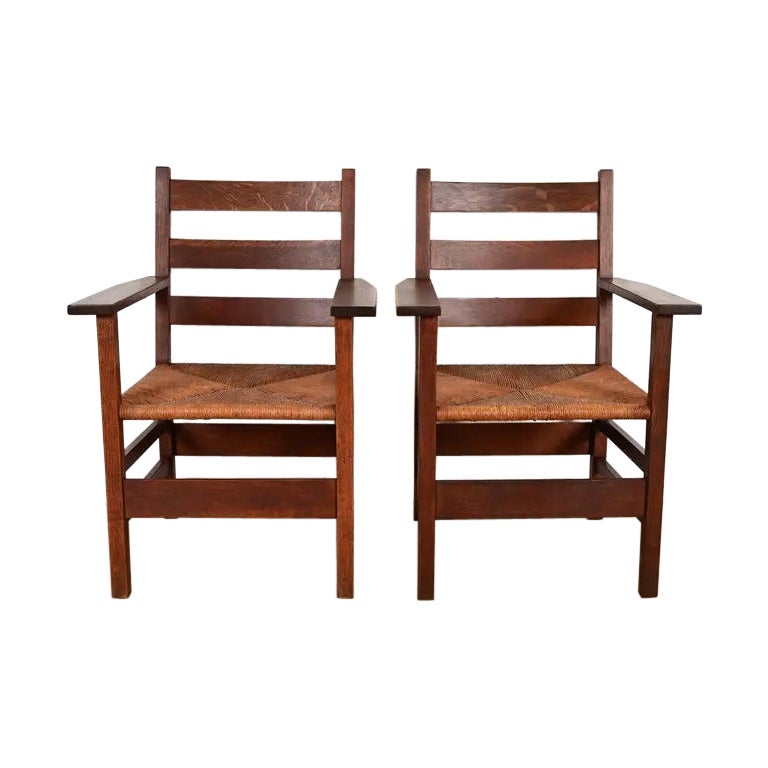 Gustav Stickley, antica poltrona Mission Arts
Crafts in Oak, coppia di poltrone con schienale a scaletta