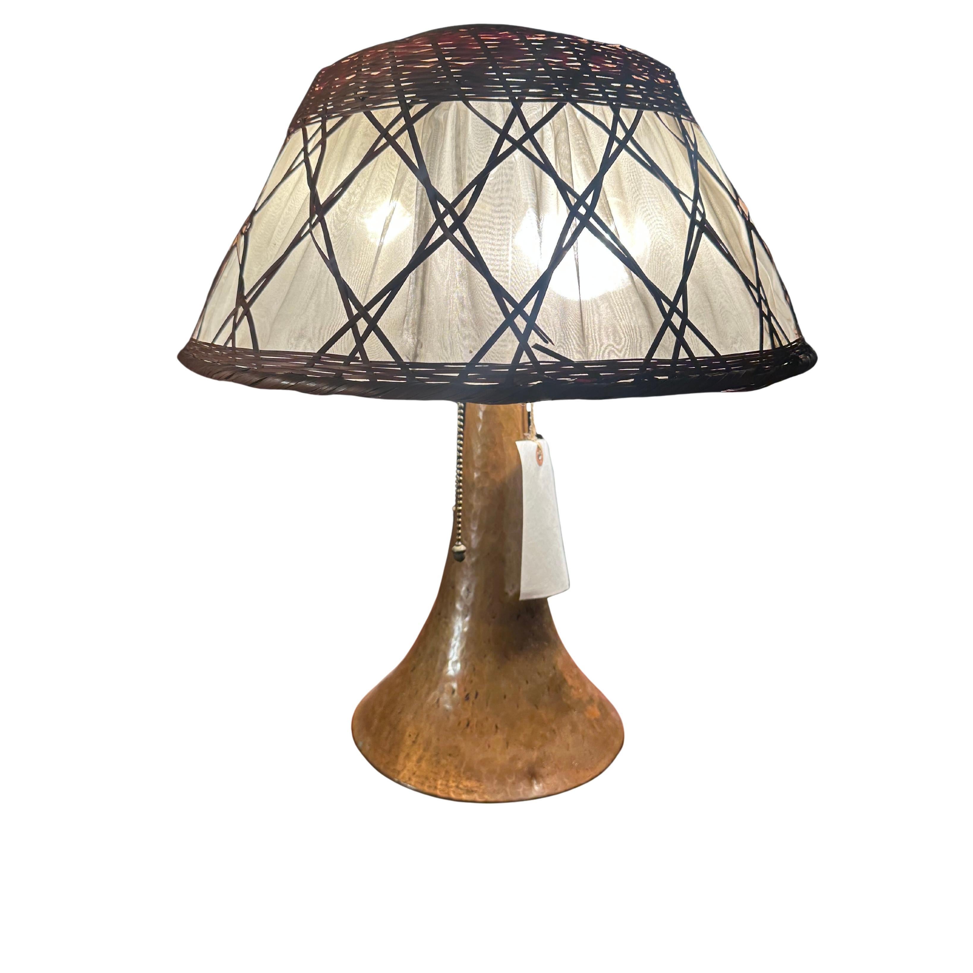 GUSTAV STICKLEY Table Lamp, Hammered Copper Base, Wicker Shade For Sale