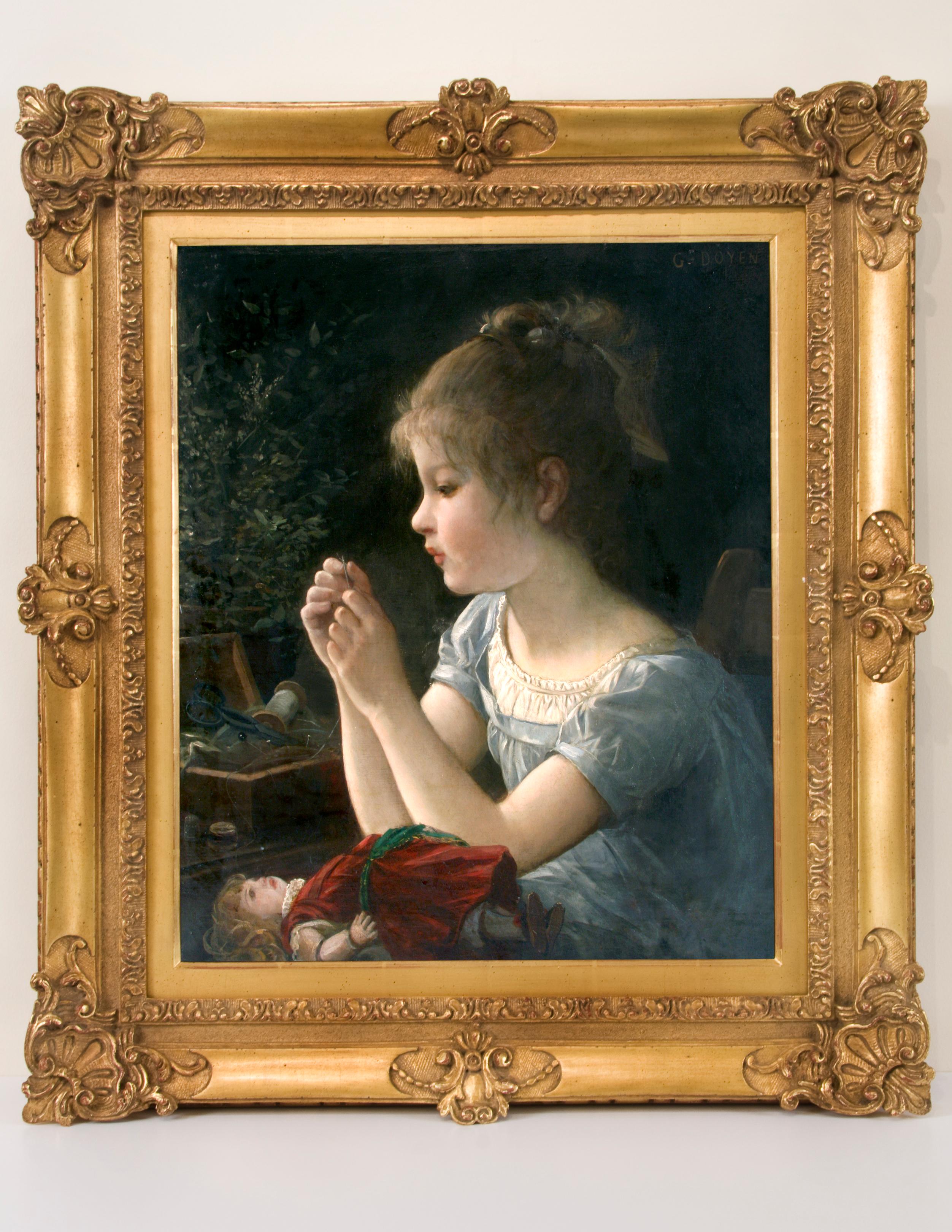 Charming example of nineteenth-century genre painting depicting a young girl, her doll, and sewing.   