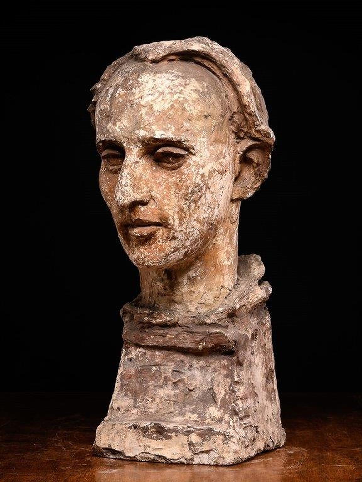 Tête sculptée et polychrome masculine modelée d
un atelier d
artiste. - Art de Gustave Fontaine