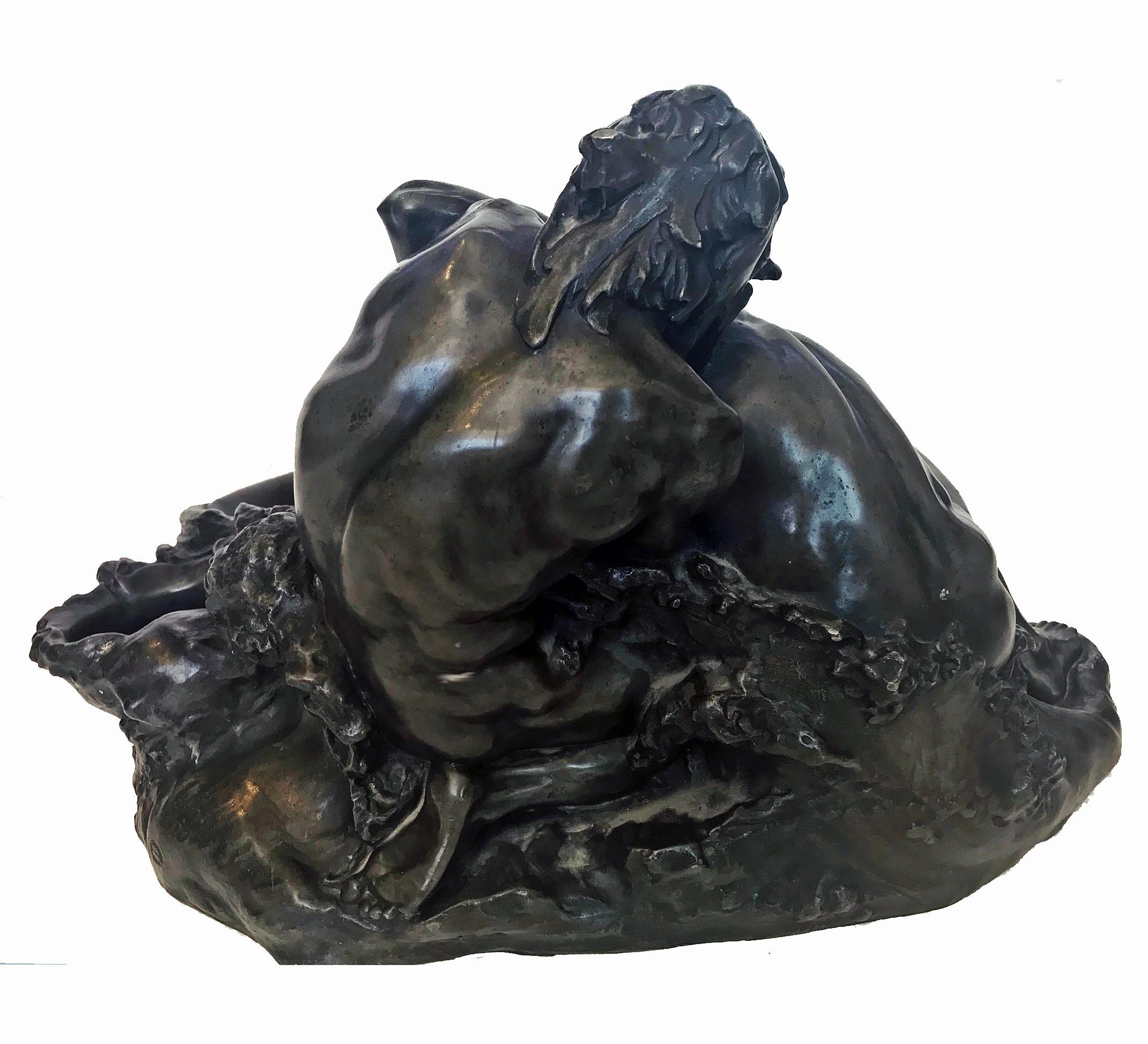 Gustave Frédéric Michel 1851-1924. Important sculpture, Les Lutteurs...The Wrestlers... in the form of a centerpiece. The cast bronze metal piece represents two male wresters struggling around a large sea shell in the waves. Dark grey green patina.