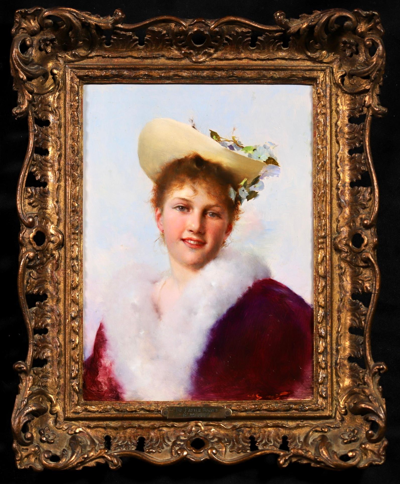 Signed oil on panel portrait circa 1890 by French Romantic painter Gustave Jean Jacquet. The work depicts a young redheaded woman wearing a red velvet jacket lined with white fur. On her head she is wearing an Easter bonnet trimmed with