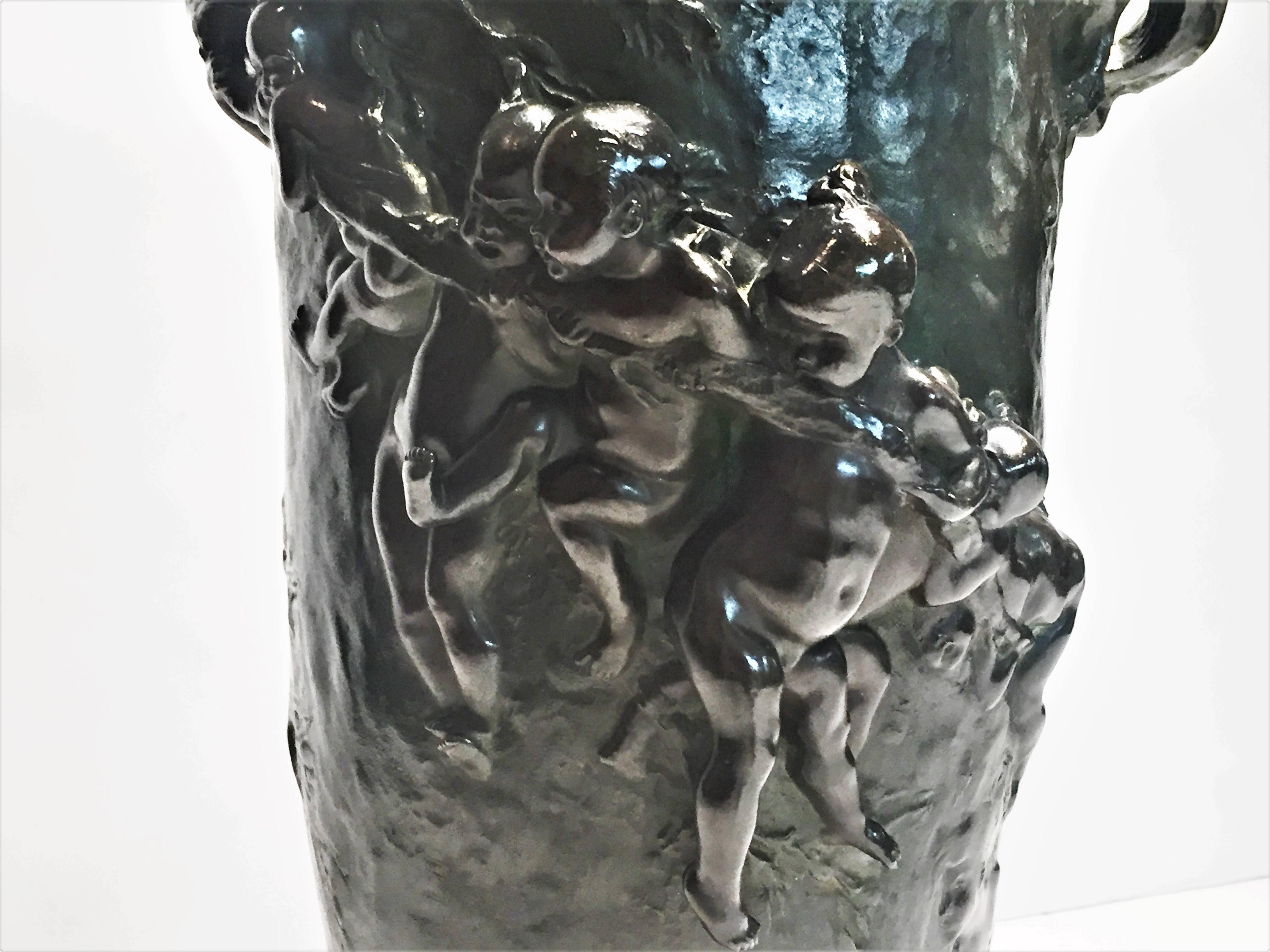 Signed ‘Joseph Chéret’ and E. Soleau. Editr. Paris 

Cast by the famous Paris foundry of Eugene Soleau, this outstanding sculptural flower vase features a picturesque group of puttee, frightened by two big frogs.

Joseph Gustave Chéret