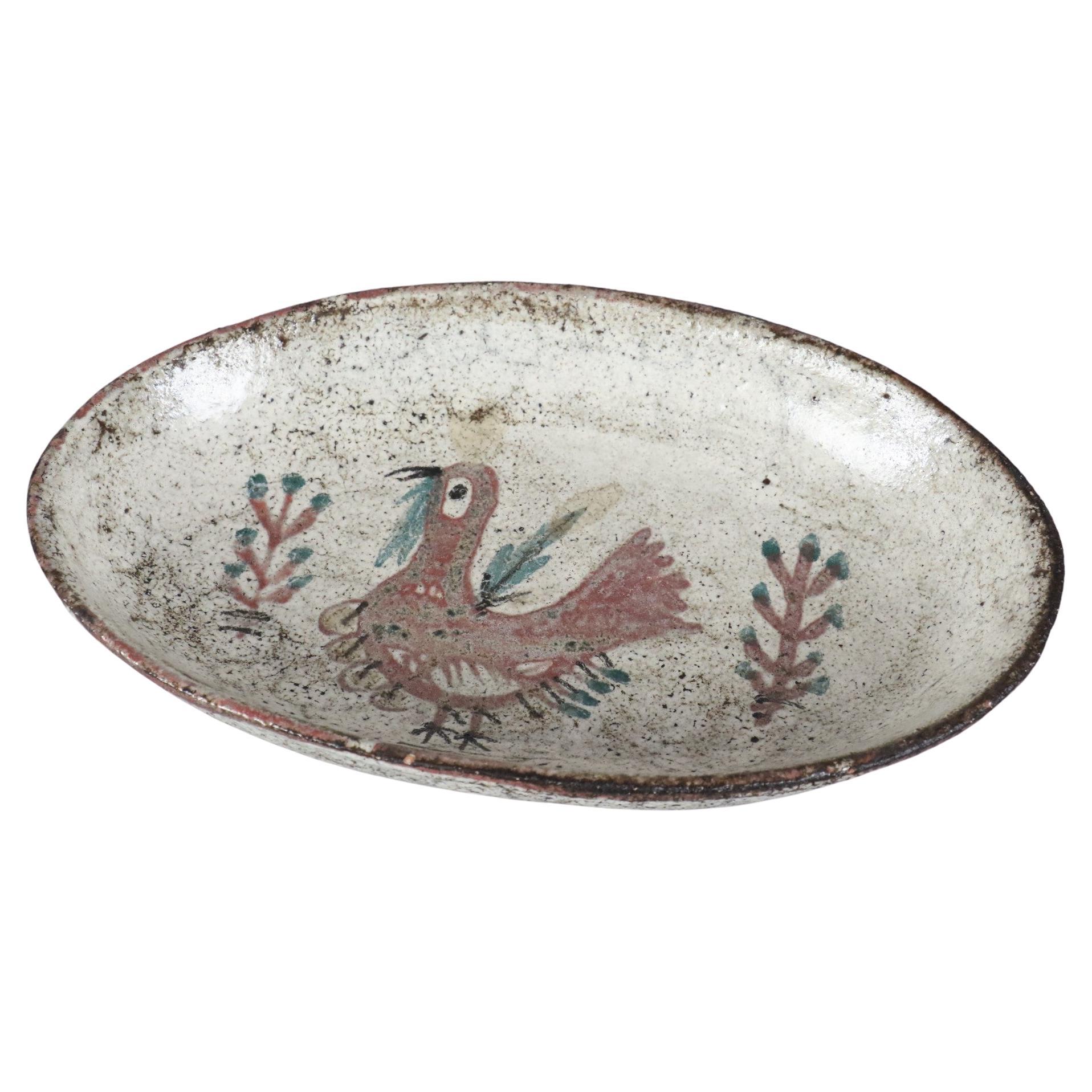 Gustave Reynaud, Le Murier Studio Pottery, Mid-Century ceramic, Vallauris, 1960s

Very nice decorative ceramic tray decorated with a red rooster. This piece is characteristic of Gustave Reynaud's work by its shape, the choice of the decorative