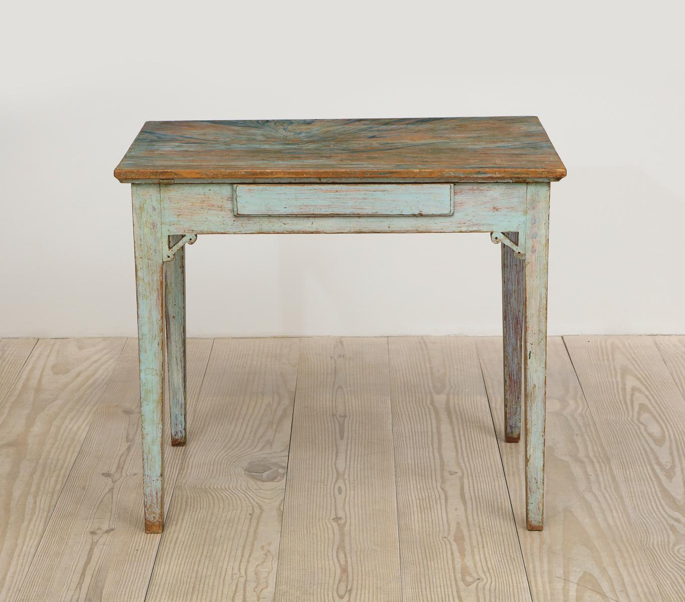 Swedish, Gustavian, 18th century table with a center drawer, circa 1790, origin Sweden

Table with beautiful, original paint and faux marble top. A wonderful desk / writing or side table.