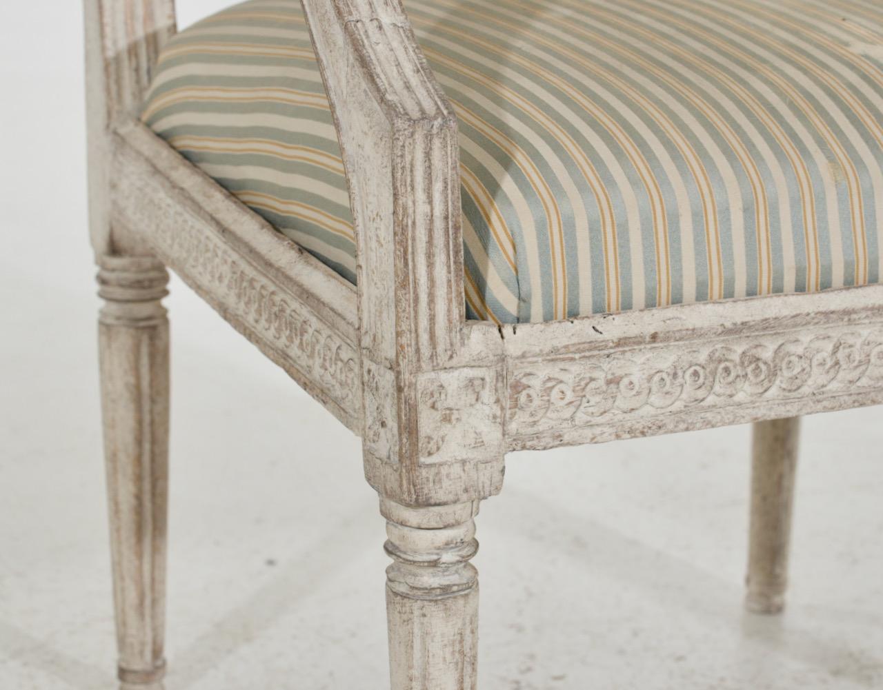 Richly carved Gustavian armchair, early 19th C.