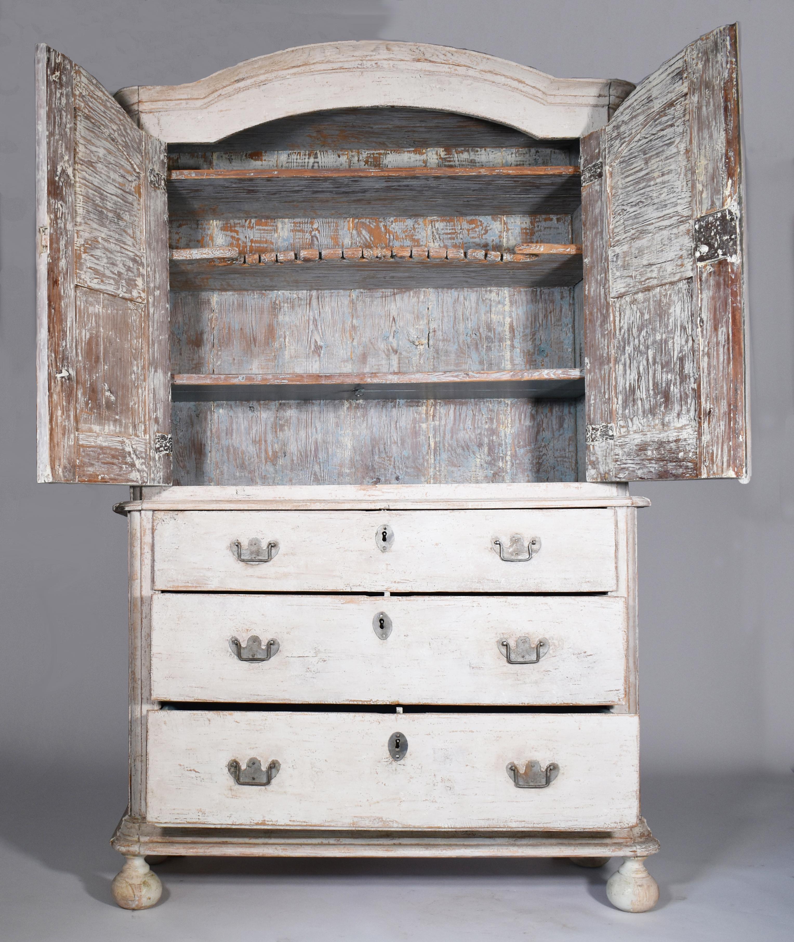 Beautifully proportioned Swedish cupboard or buffet with a white-gray exterior. Hand-carved reeding and diamond detail, original forged handles, escutcheon, and key. Interior scraped to show a lovely blue-grey finish.