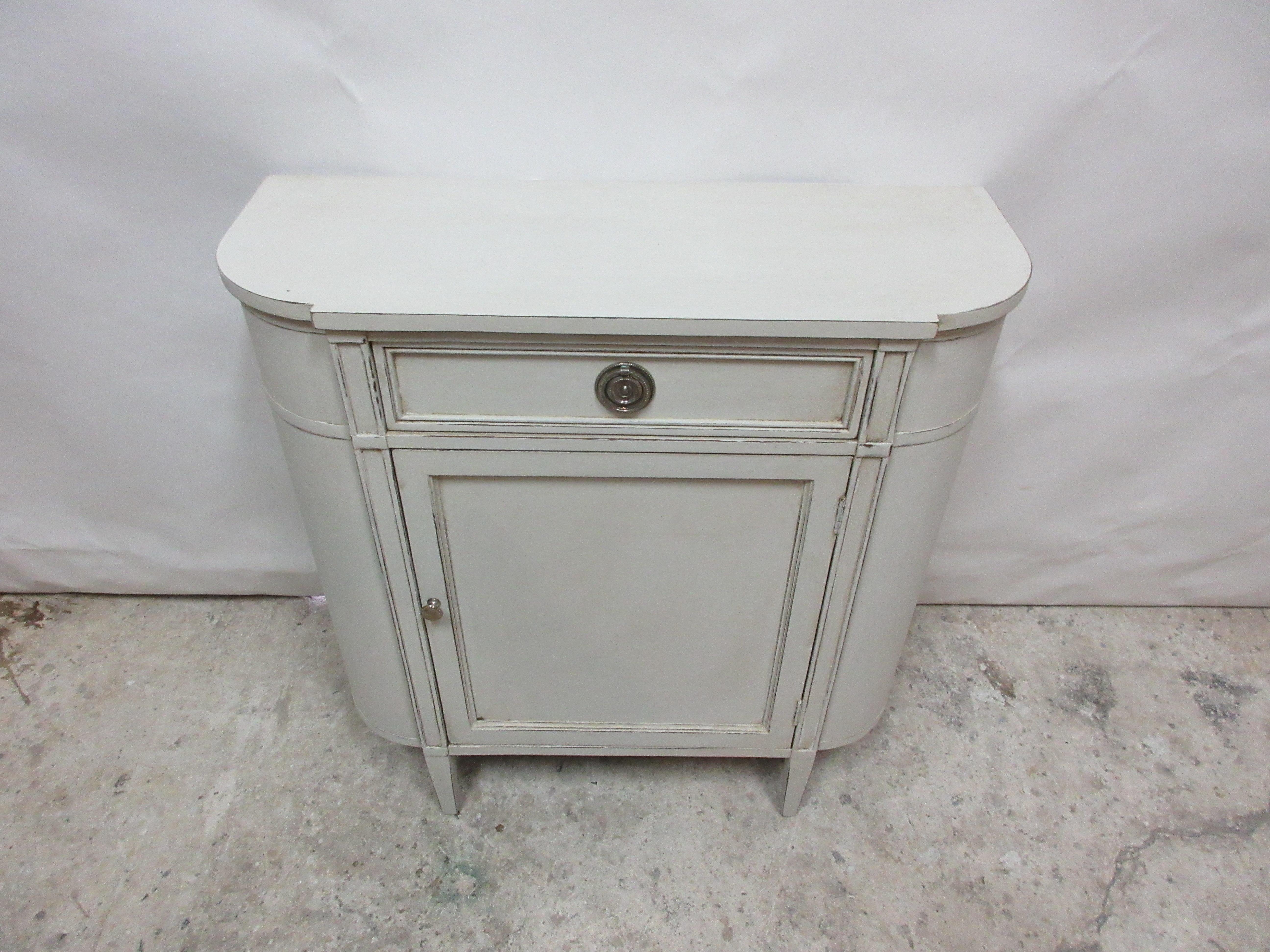 This is a Gustavian Console cabinet, it has been restored and repainted with milk paints 