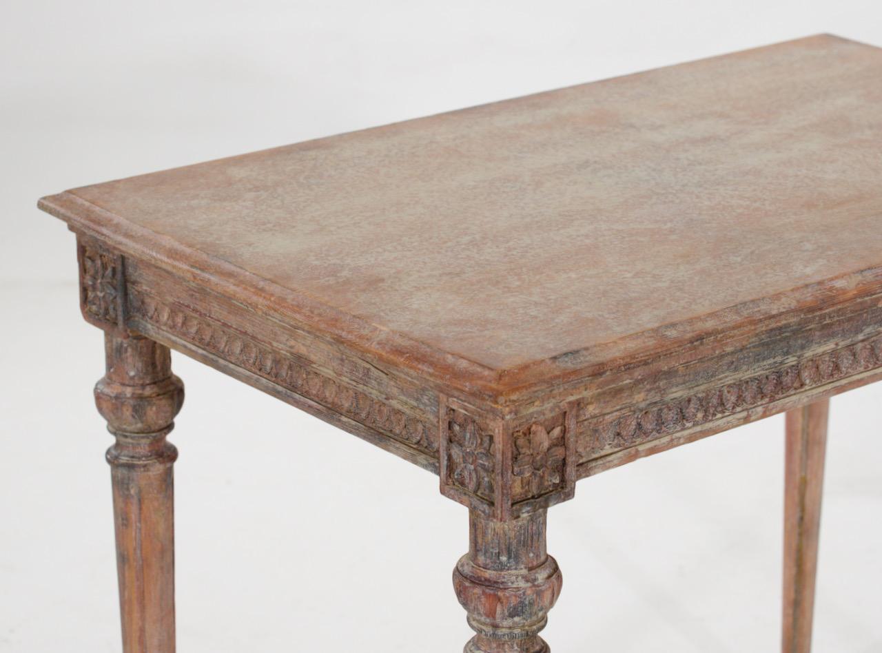 Stunning freestanding Gustavian console table in original paint, richly carved, 18th Century.