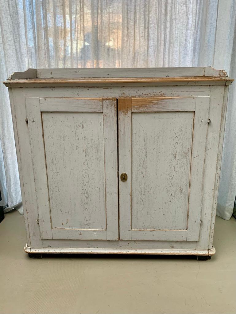 Beautiful antique Swedish Gustavian (1770-1810) cupboard scraped back to the original color - wonderful patina and with 3 shelves behind the 2 doors.