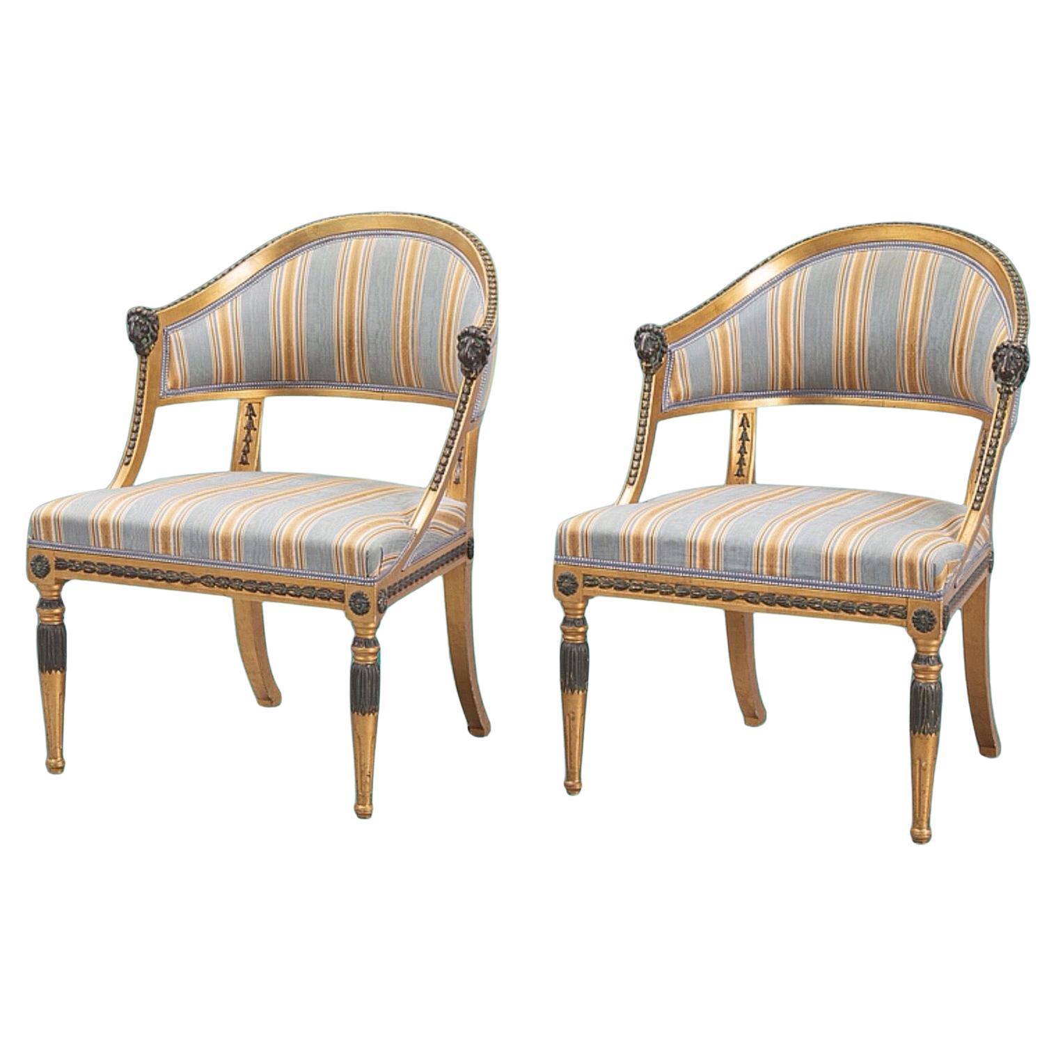 Gustavian gilt Armchairs with Lions heads, a pair,  Sweden, end 19th century  For Sale