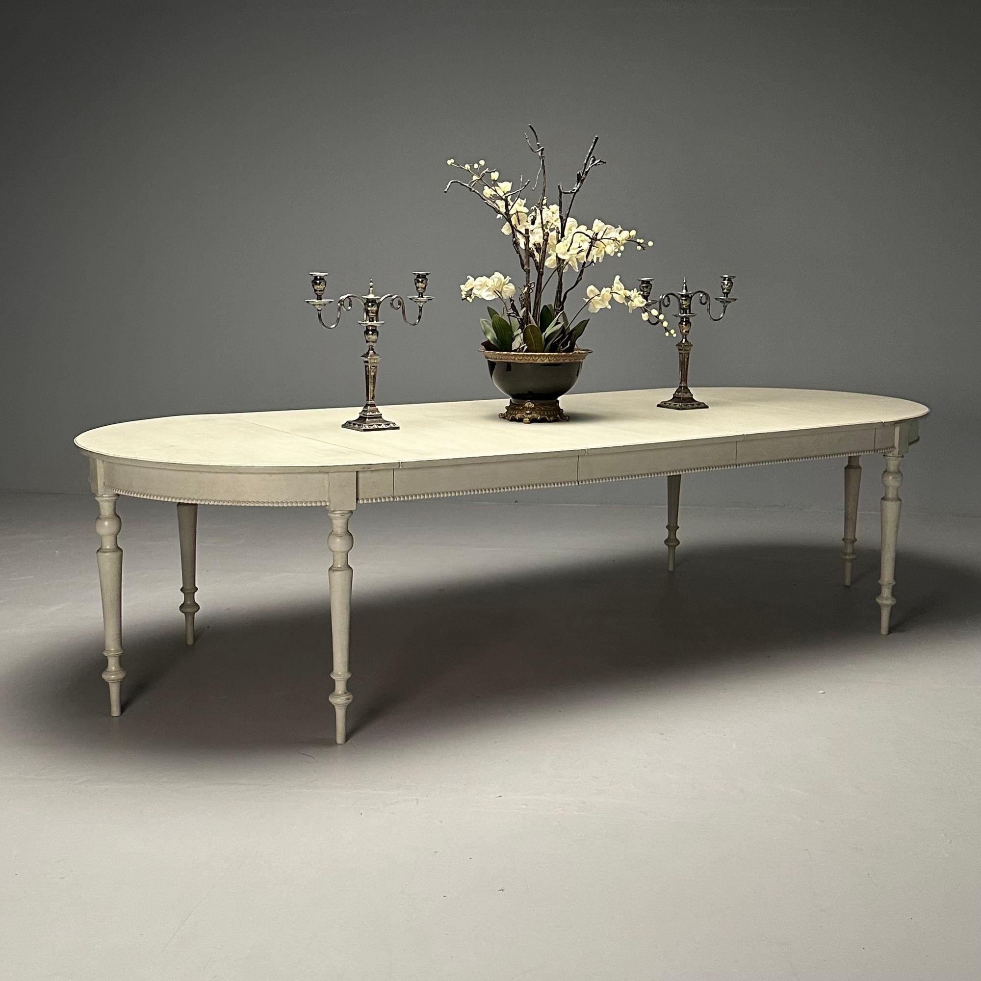 Gustavian, Large Swedish Dining or Conference Table, Gray Paint Distressed, Sweden, 1970s

Large six legged Gustavian dining table designed and produced in Sweden circa 1970s. Having a gray paint distressed finish. This table has a beaded apron and