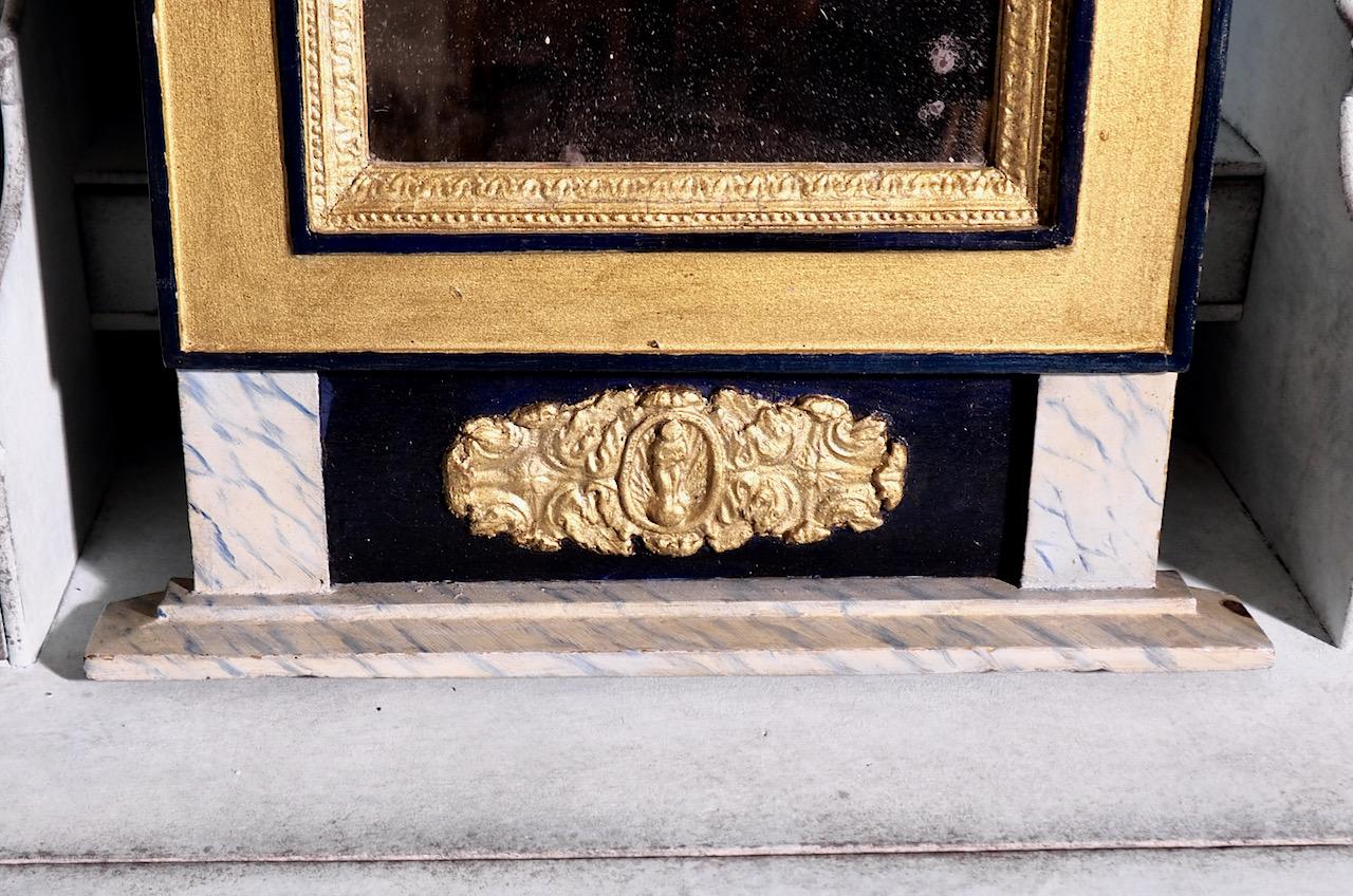 Charming late Gustavian mirror, in original paint and guild, circa 1810 - 30.