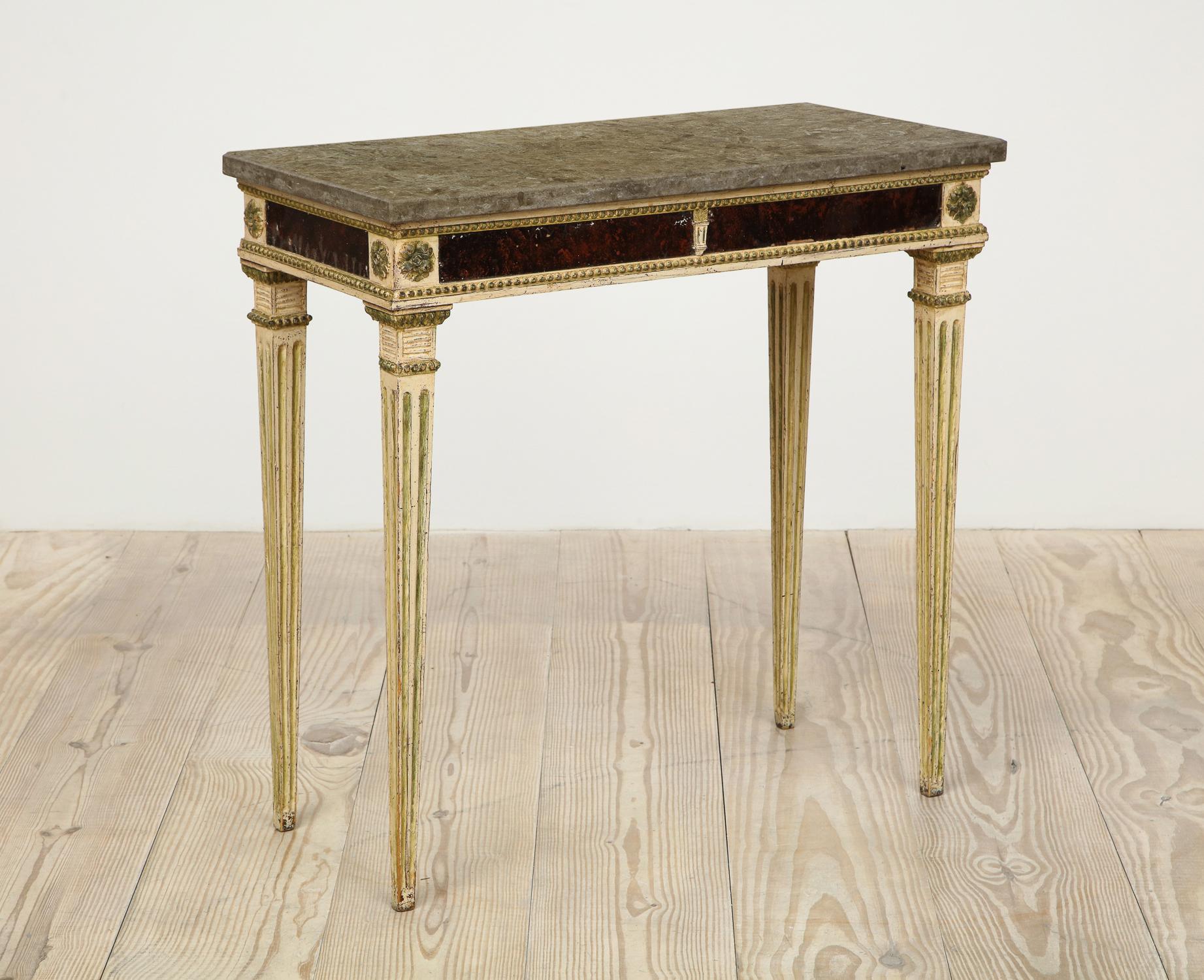 Gustavian neoclassical console with stone top, origin. Sweden, circa 1780, original paint, inset panels with reverse painting on glass imitating porphory and komstad stone top.

A beautifully proportioned, elegant 18th century neoclassical console