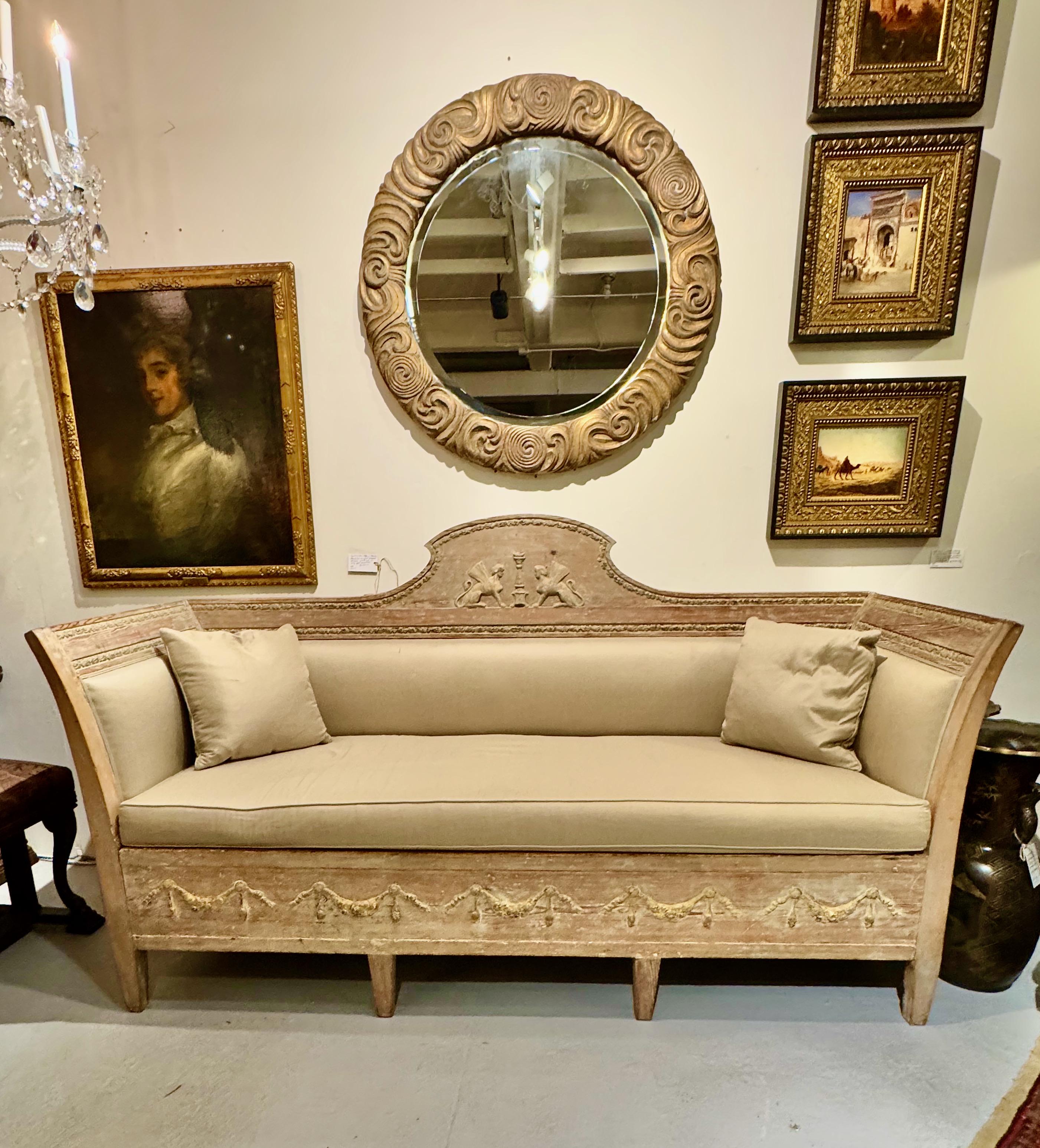 This is a very good example of a Gustavian Sofa or Bench that dates to the end of the 18th century or beginning of the 19th century. The sofa is in overall good to very good original condition. It retains its scraped old surface with a wonderful