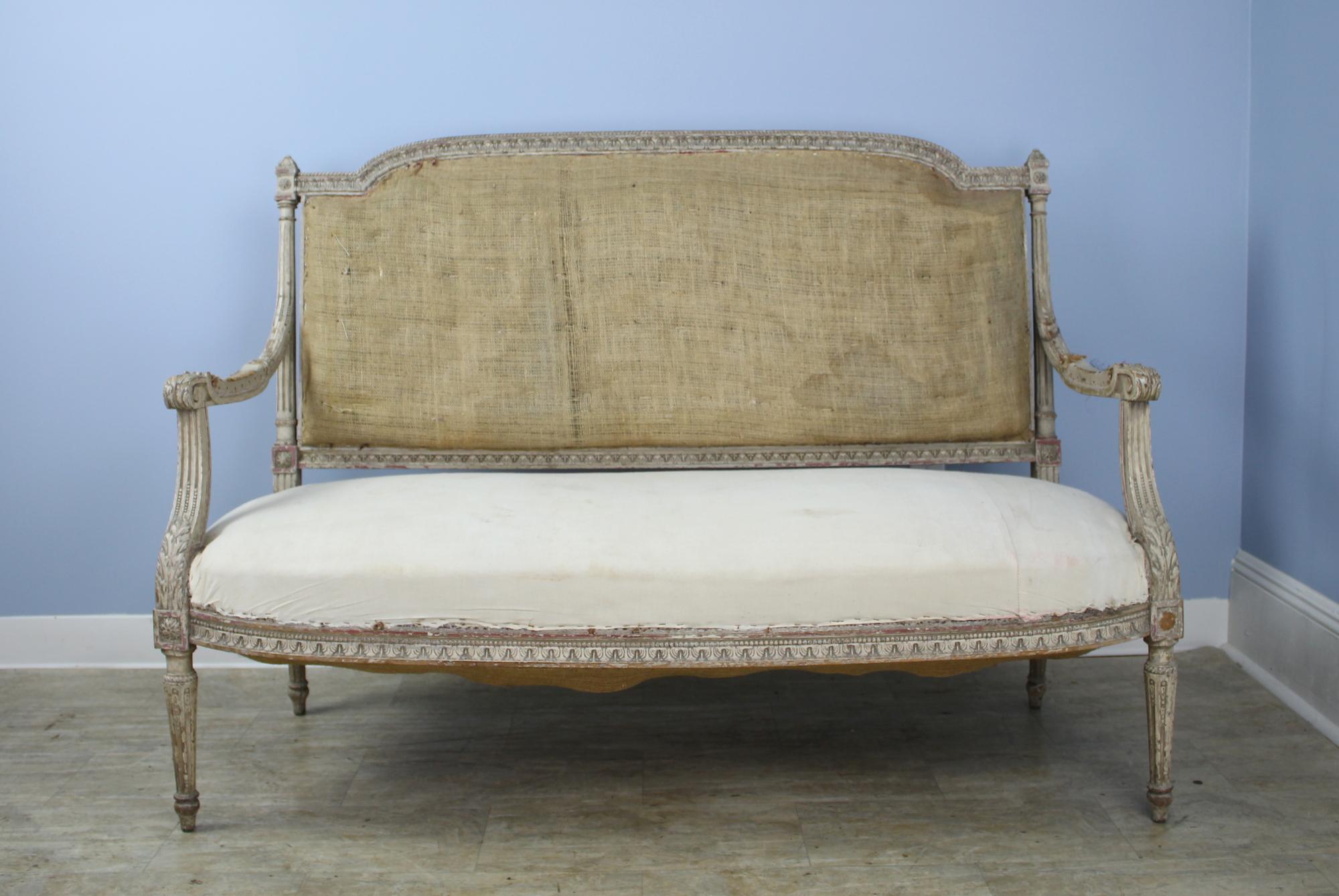 A charming and elegant smaller sofa/loveseat, at just 56.5