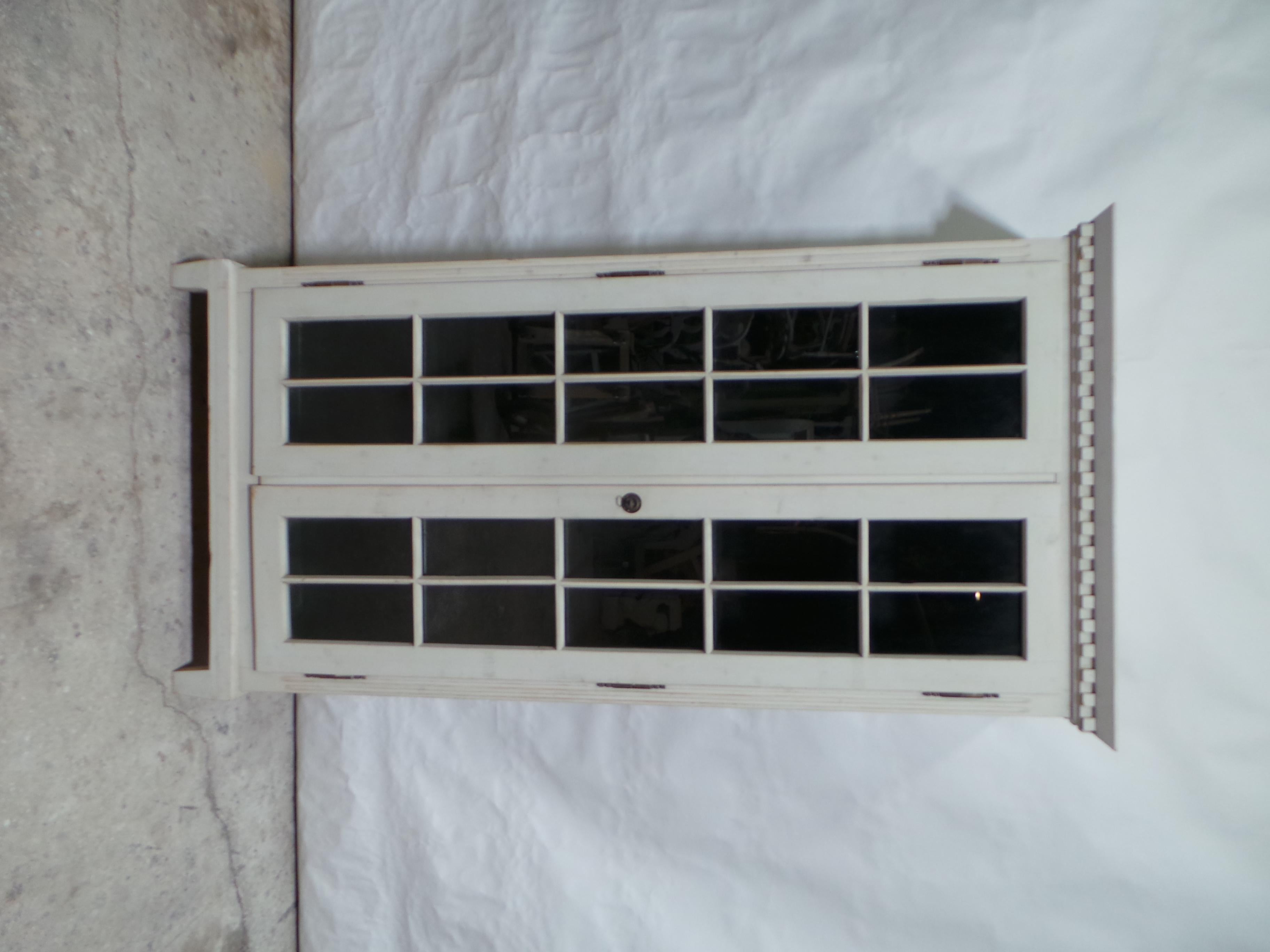 This is a Unique Gustavian Style 2 door display cabinet / Vitrine. the shelves are removable, and inside measurements are 12 deep 38 wide.
Normally the inside is painted an Antique White but Not this one. it was used for and incredible Blue Vase
