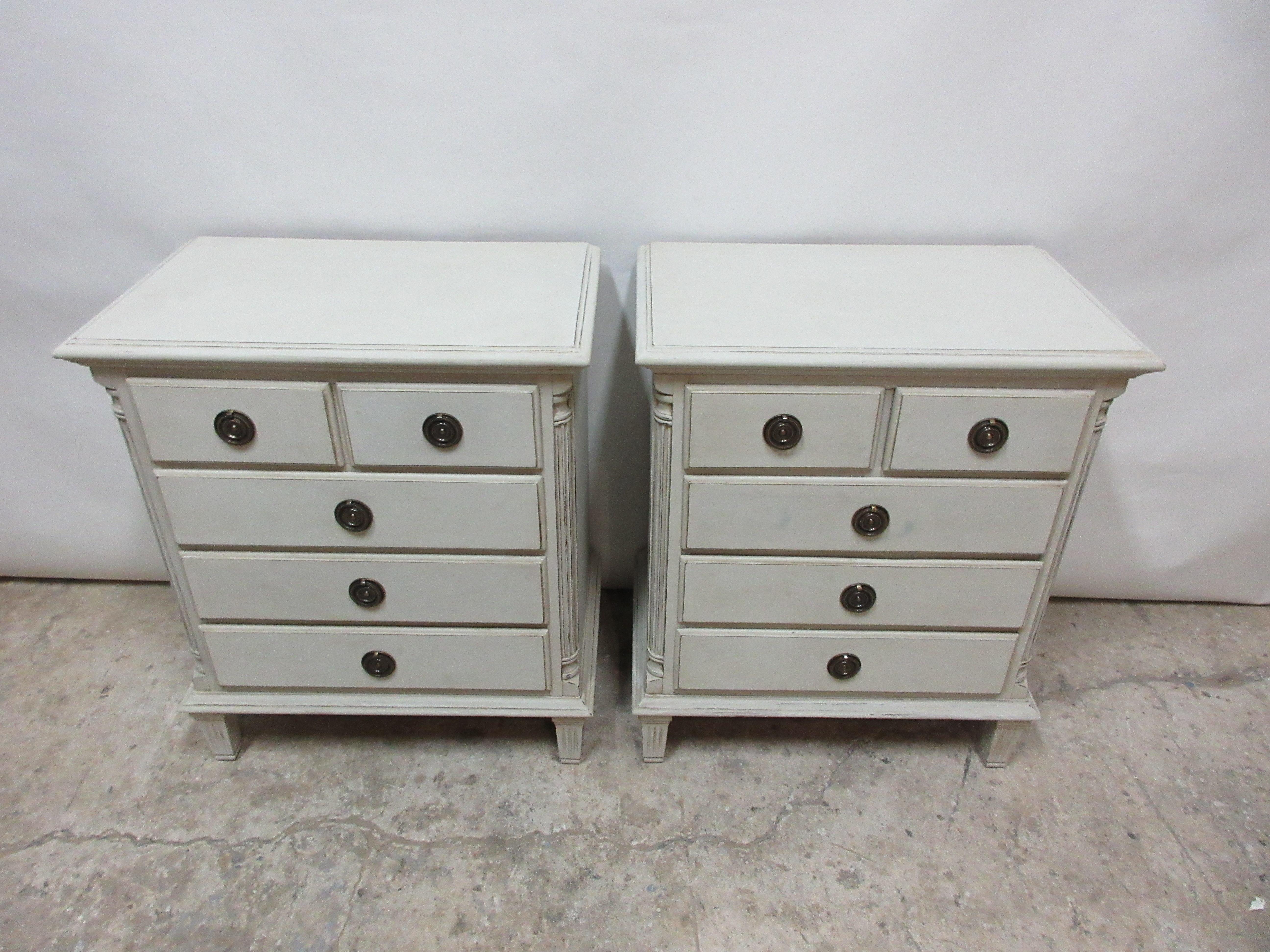 This is a set of 2 Gustavian style 5-drawer nightstands. They have been restored and repainted with milk paints 