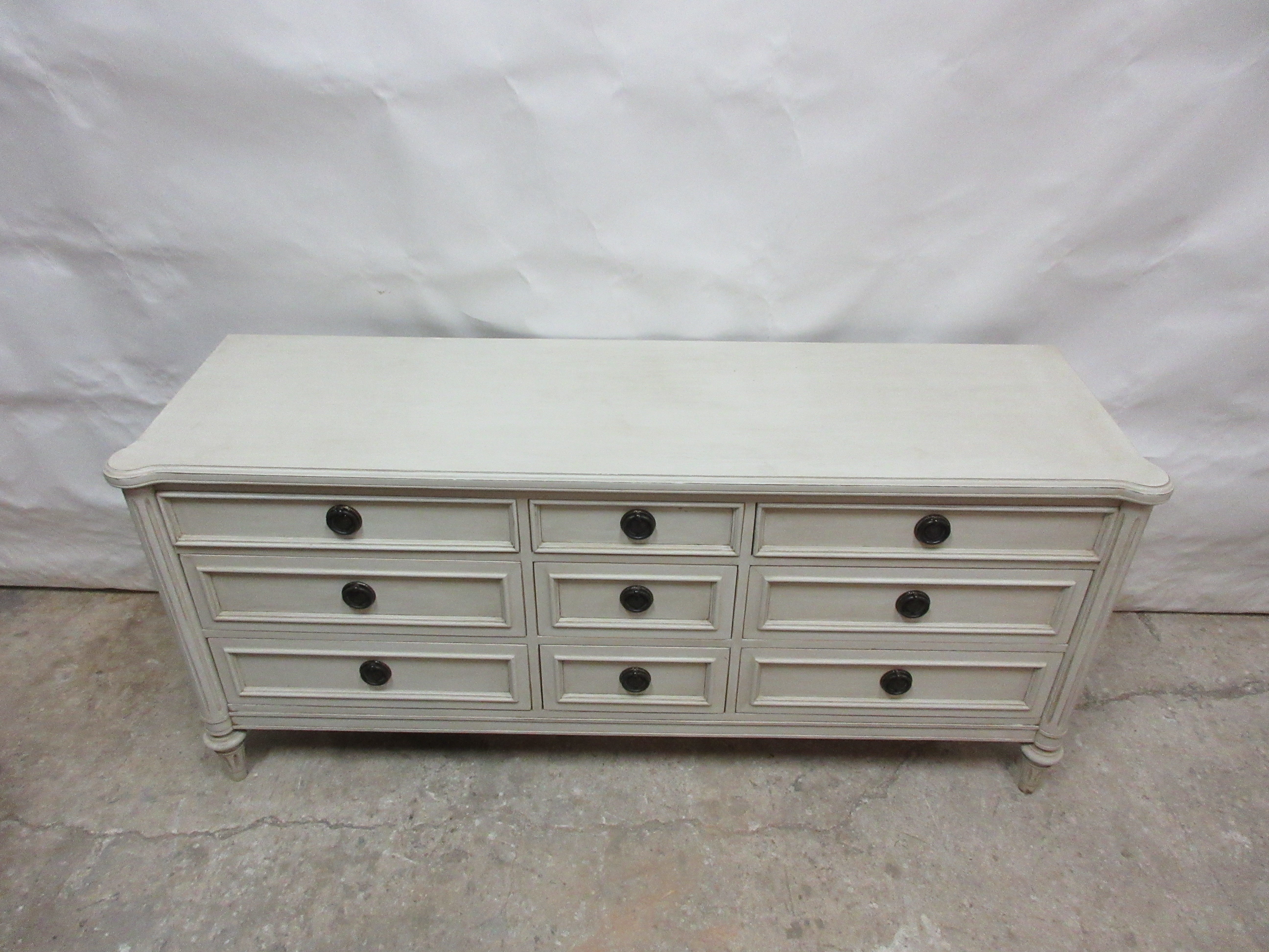 This is an unusual Gustavian style 9 drawer dresser. Its been restored and repainted with milk paints 