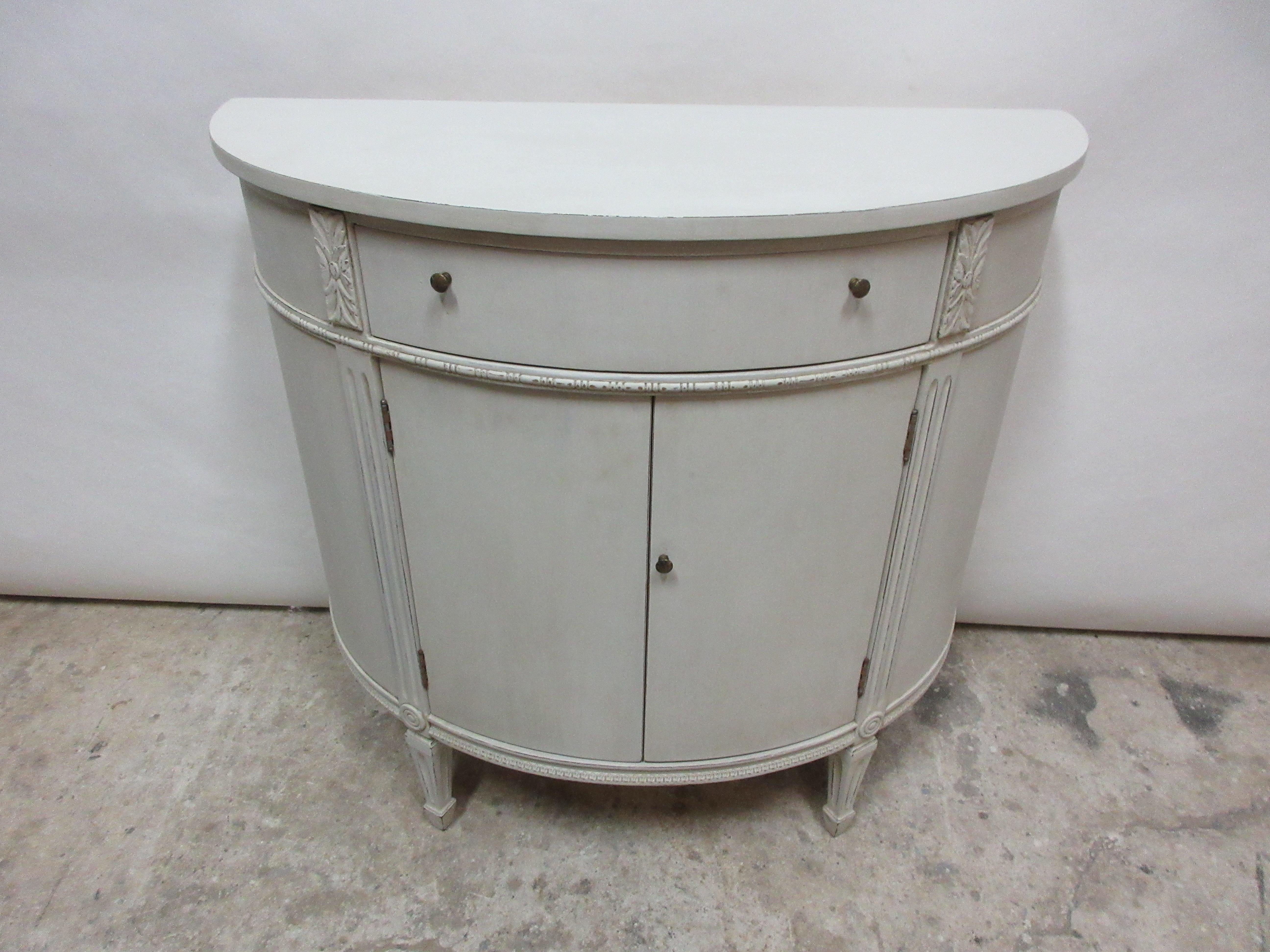 This is a Gustavian style barrel console, its been restored and repainted with Milk Paints 