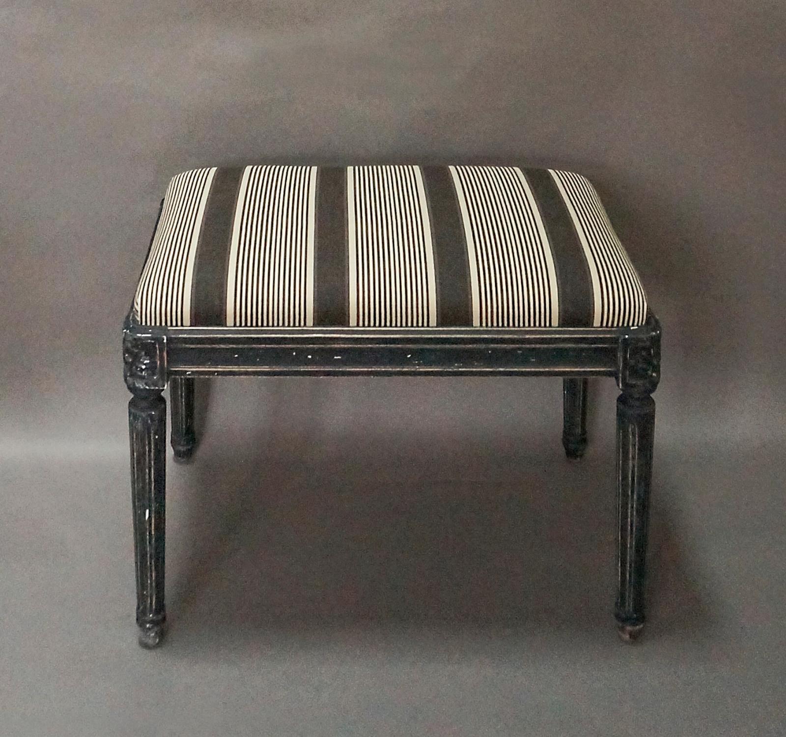 Swedish bench, circa 1920, in the Gustavian Style. Reeded and tapering round legs below corner blocks with carved rosettes. Slip seat.