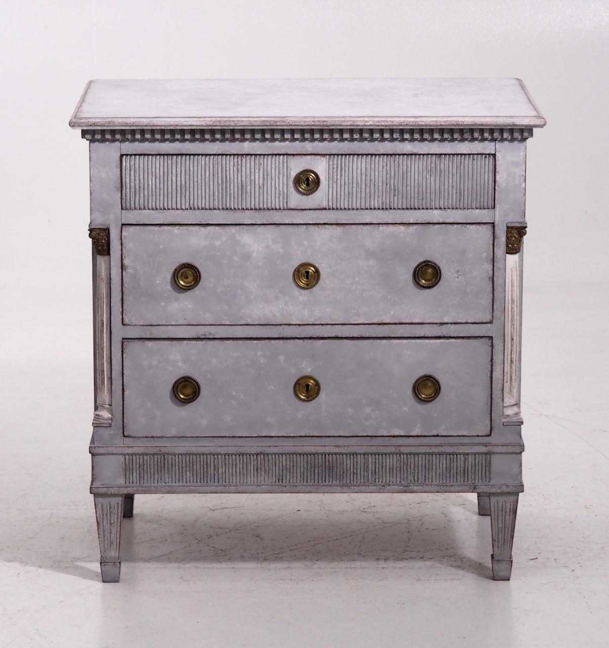Gustavian style chest with carved columns and bronze mountings. Finely carved drawers, with key original locks, late 19th century.