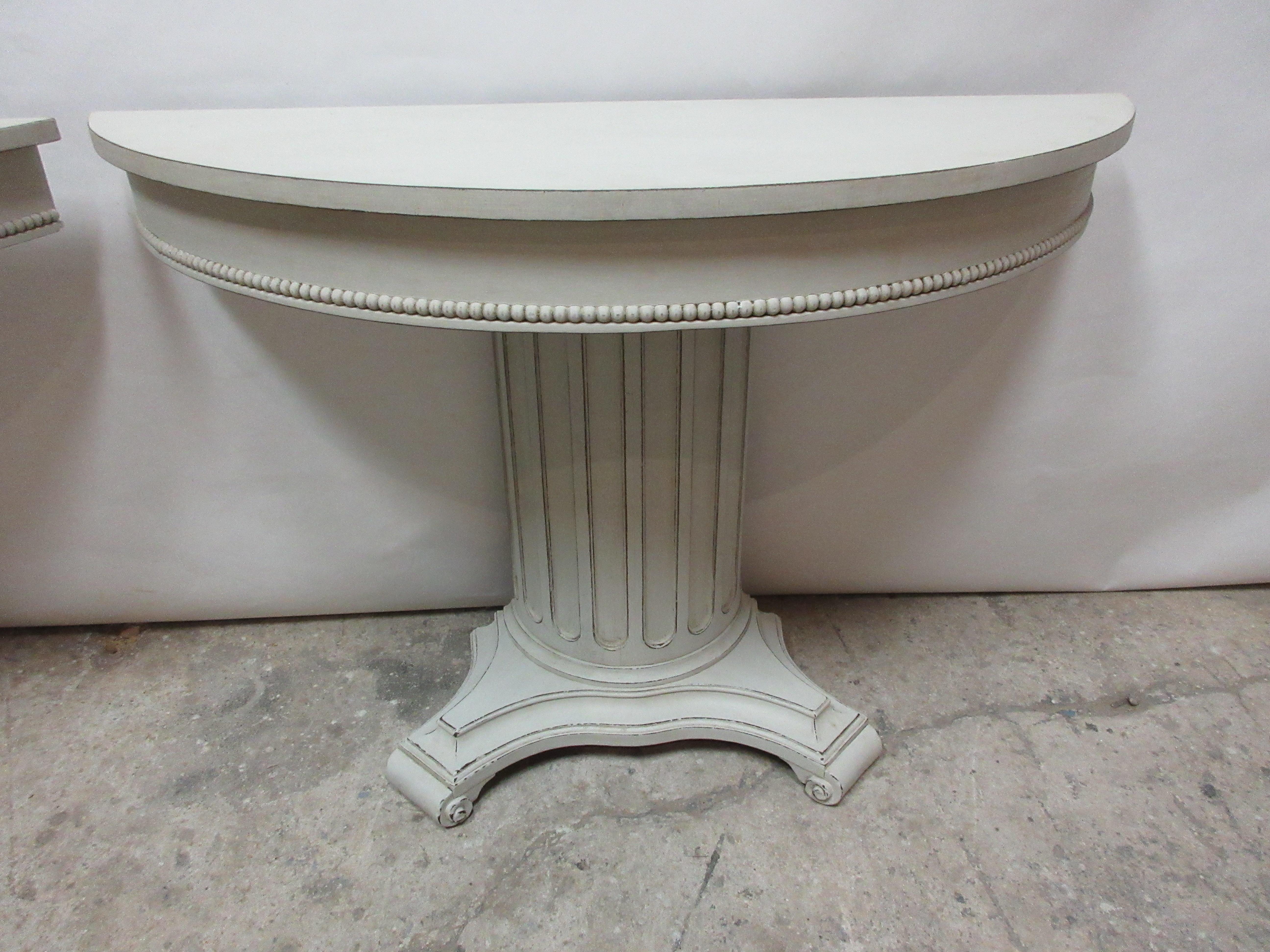 This is a set of 2 Gustavian style column console tables, they have been restored and repainted with milk paints 