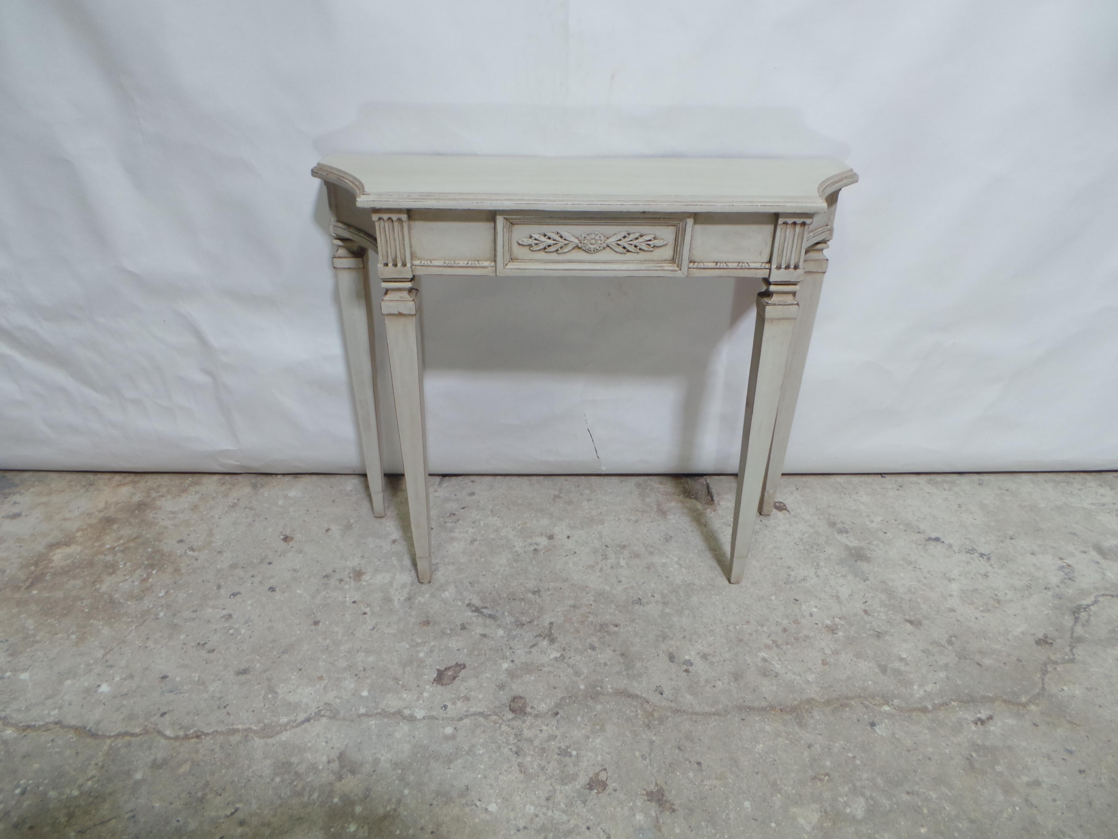 This is a unique Gustavian Style Console Table.  Its been restored and repainted with Milk Paints 