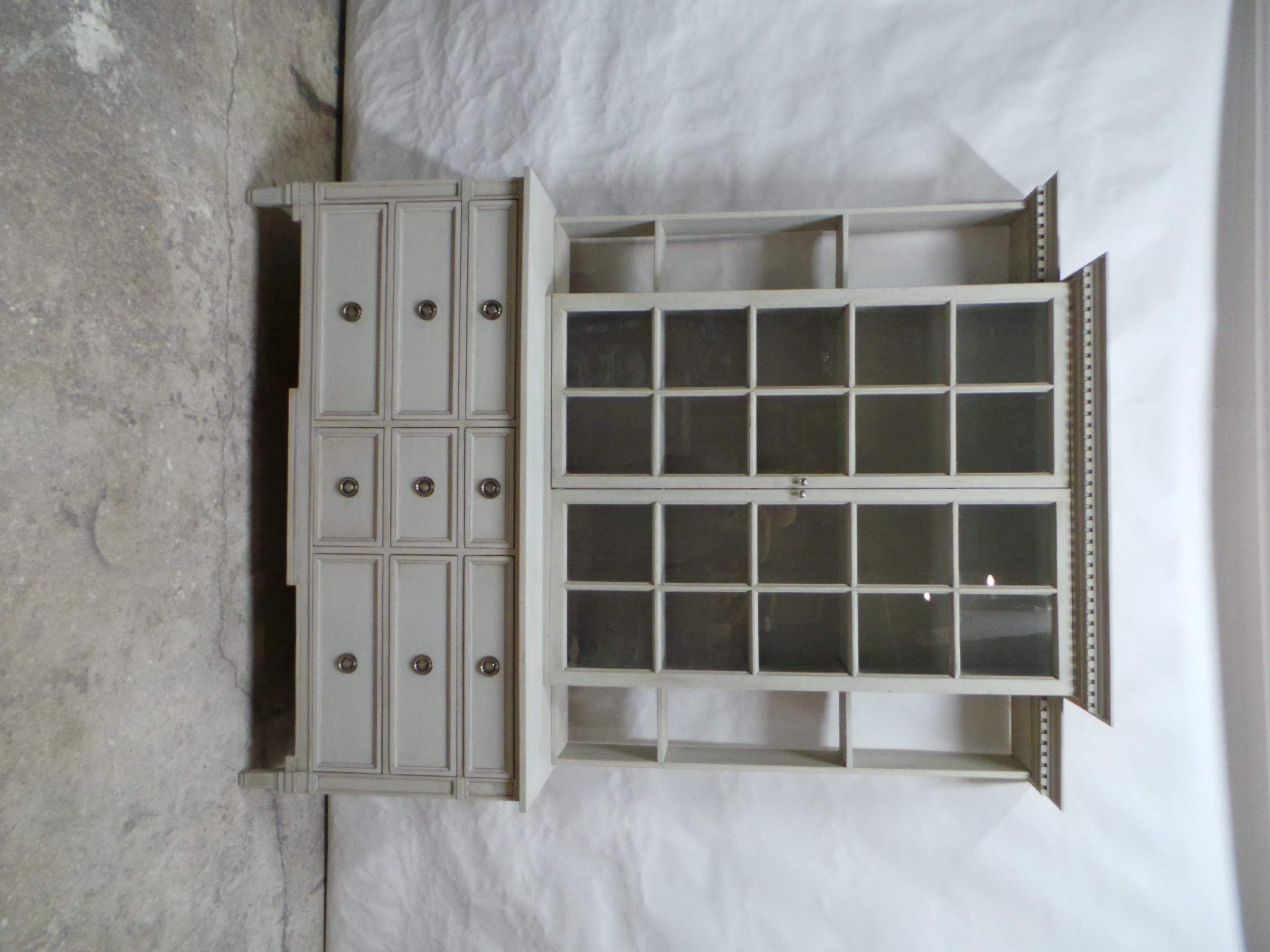 This is a Gustavian Style Glass Top Dresser.  the Dresser itself is Vintage circa 1950, the upper glass top is new made using 100 year old Antique windows.   Milk Paints 