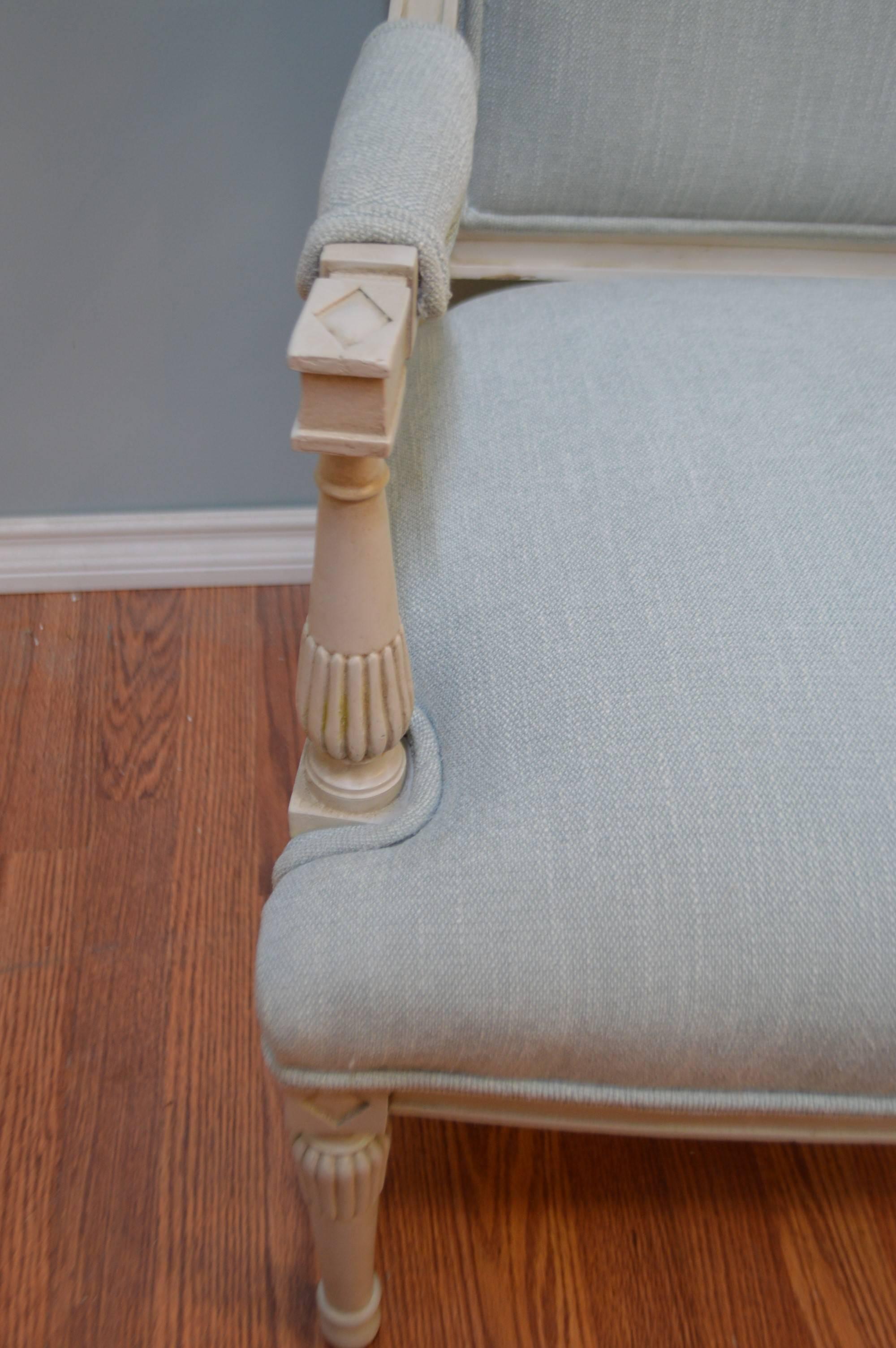 Elegant, Gustavian style painted in a light gray brushed linen. The linen is soft to the touch and a lovely light blue tone. The tight seat is very comfortable.