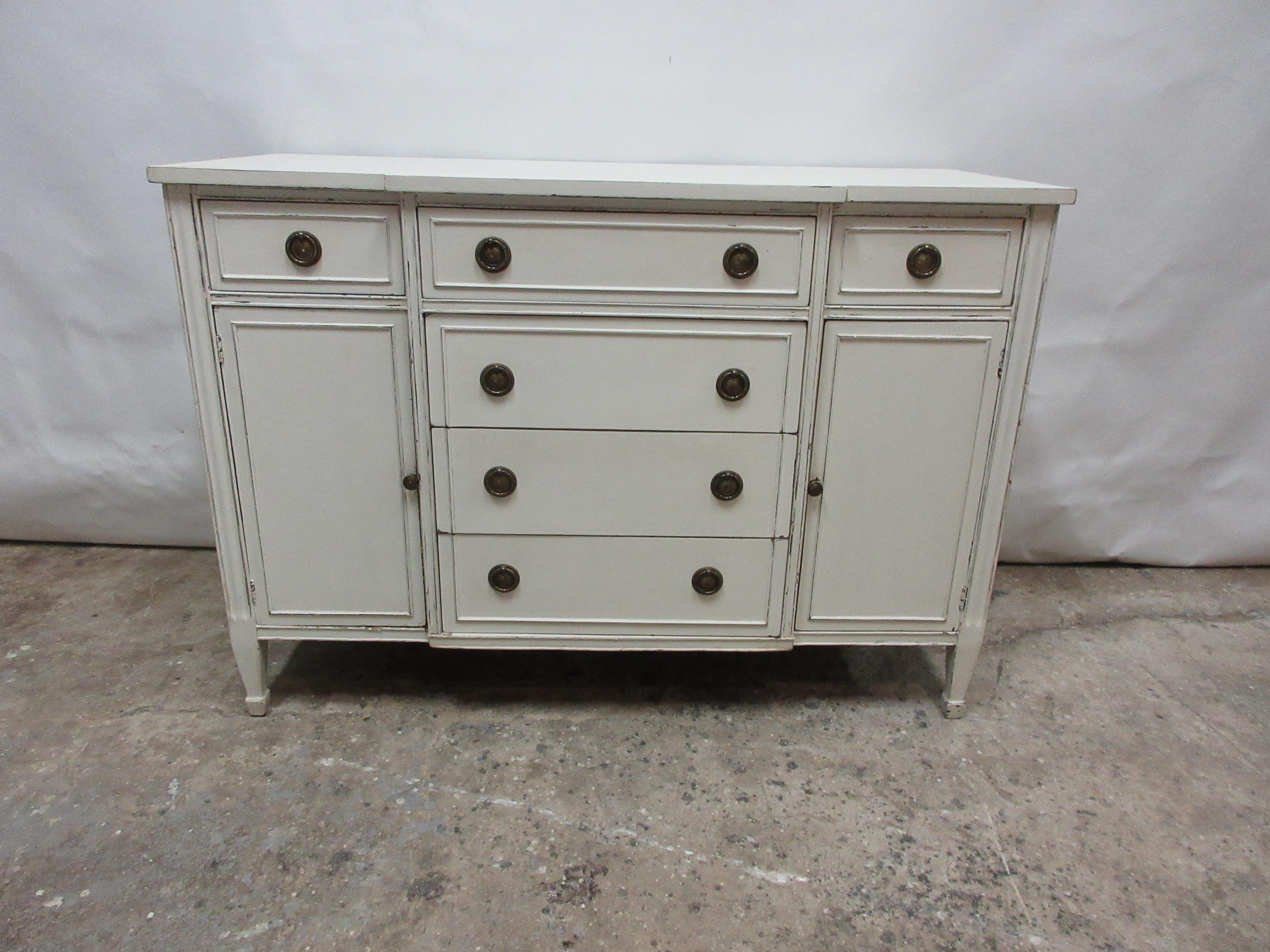 This is a Gustavian style sideboard. Its been restored and repainted in milk paints 