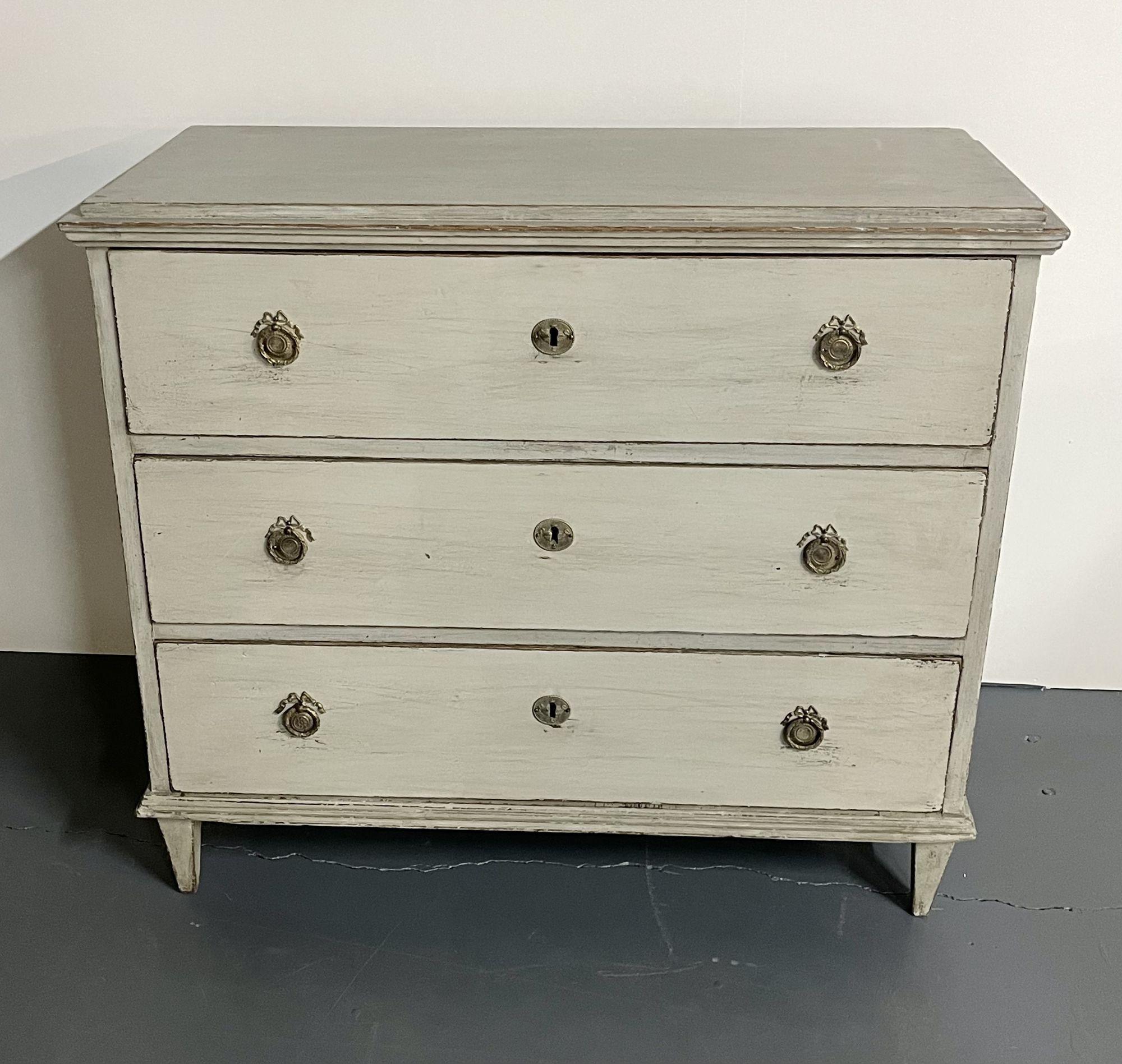 Gustavian Style Swedish paint distressed dresser, commode / nightstand, brass, 19th century 

Swedish paint distressed antique dresser, nightstand, or commode with the original paint still intact. Having three drawers with brass pulls. Fantastic