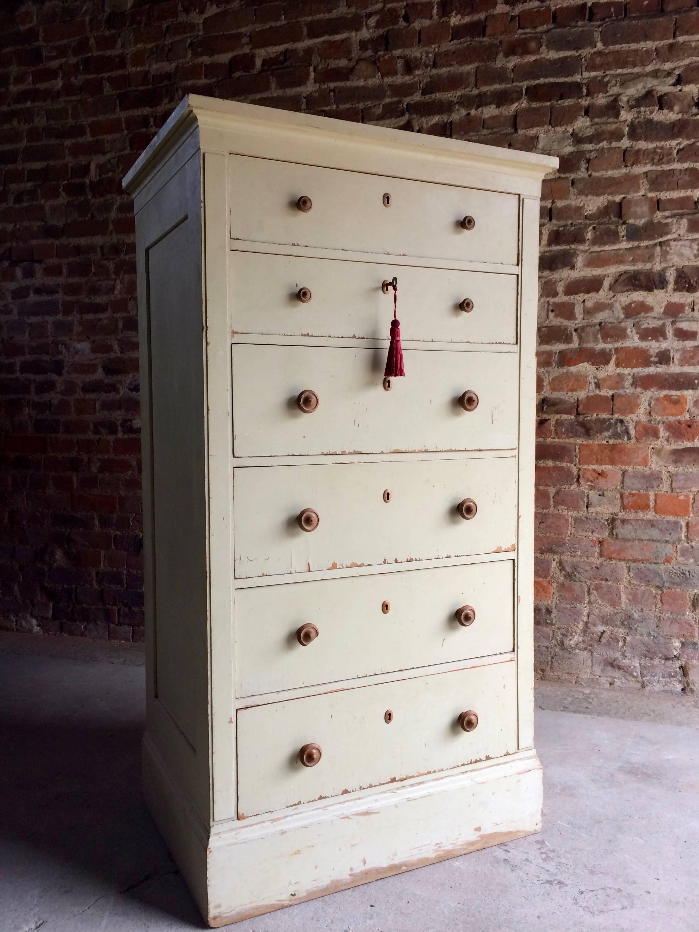Magnificent tall and elegant antique Gustavian Style tallboy chest of drawers, circa 1850s, the rectangular top over six graduated drawers all with original drawer pulls and wooden escutcheons, comes with one original working key with tassel, raised