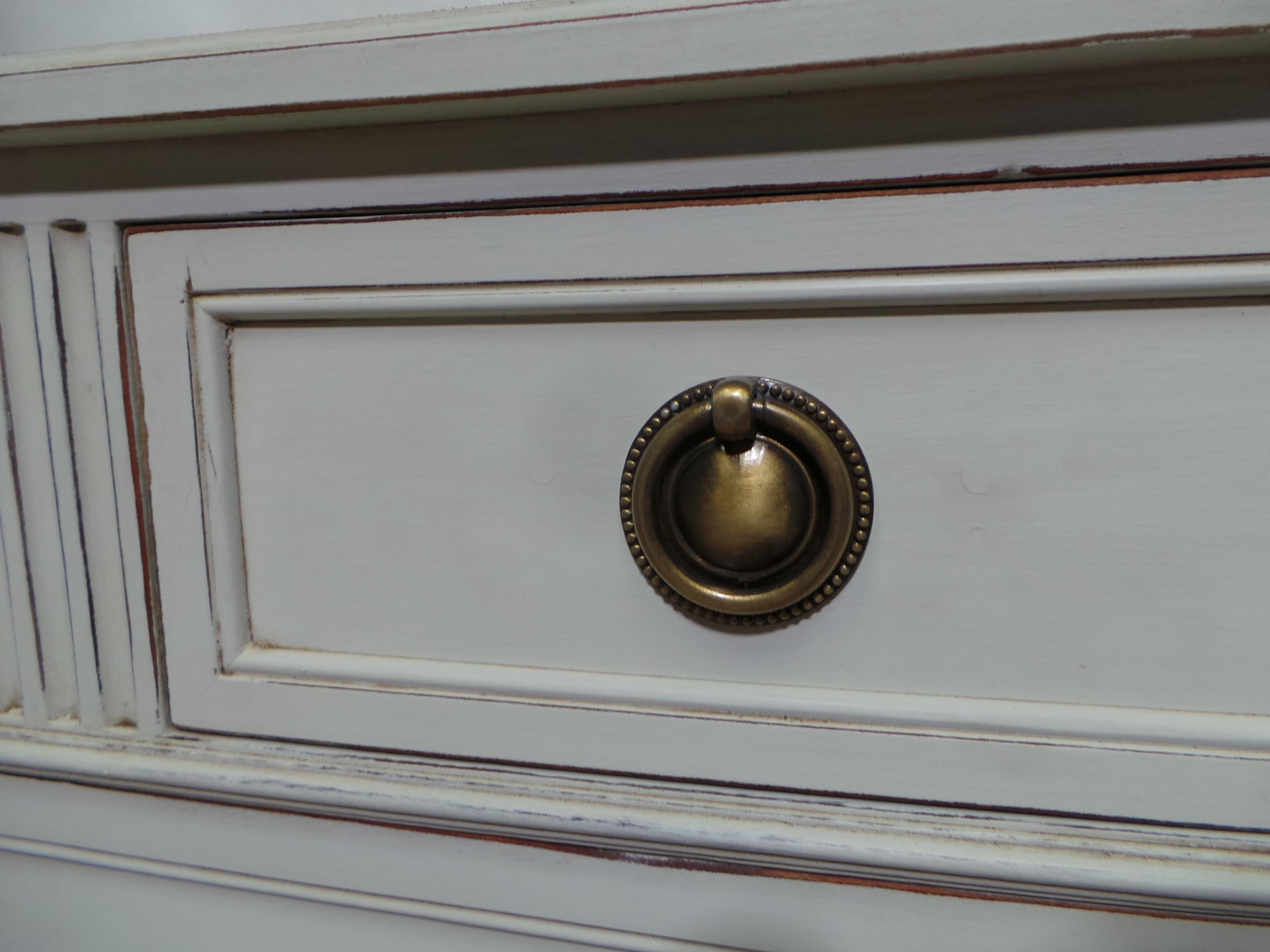 This is a Gustavian Style Unique 7 Drawer Chest of Drawers. its been restored and repainted with Milk Paints 
