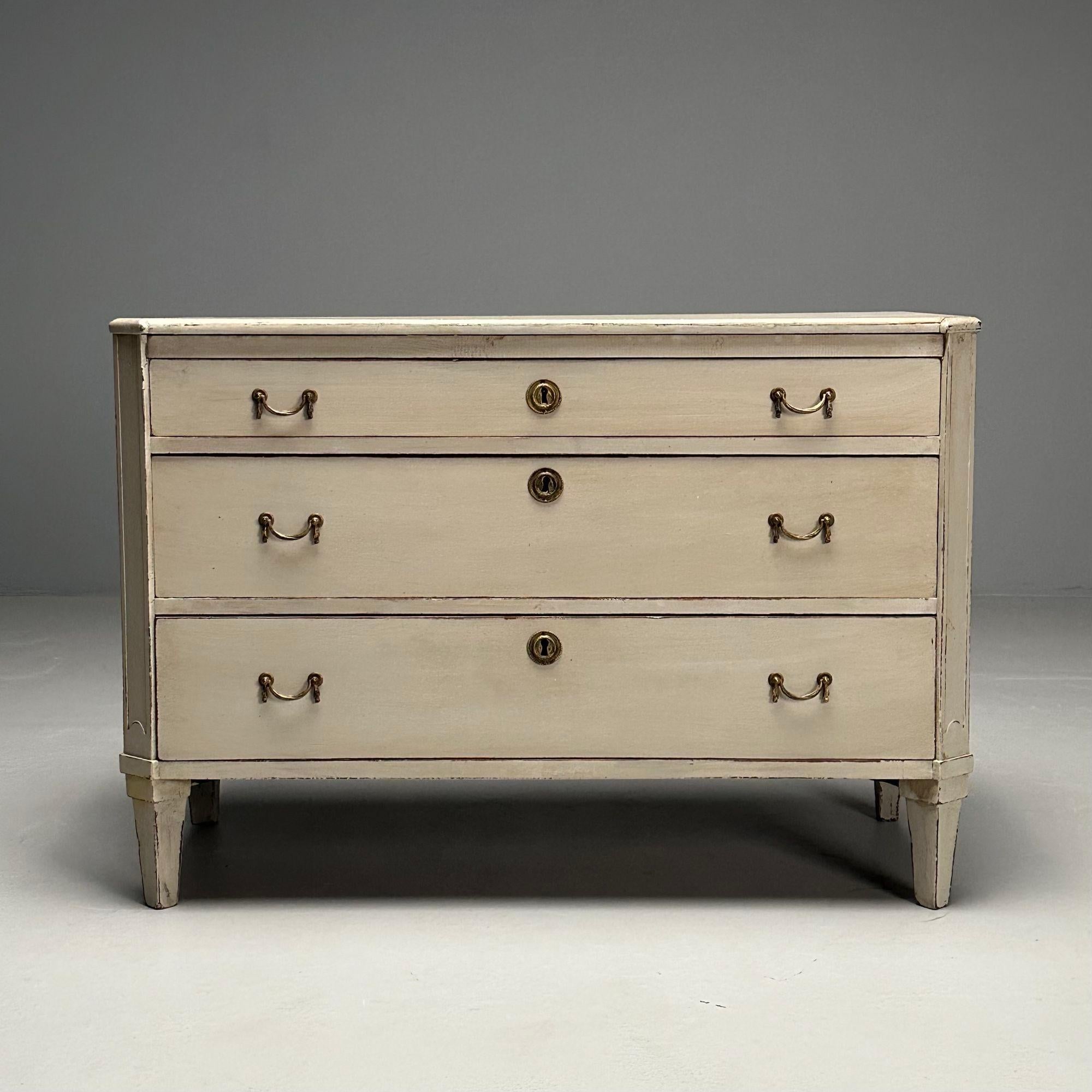 Gustavian, Swedish Commode or Dresser, Grey Paint Distressed, Brass, Sweden, 1900s

Gustavian dresser or chest of drawers designed and produced in Sweden in the early 20th century. This example features a distressed light gray paint decorated