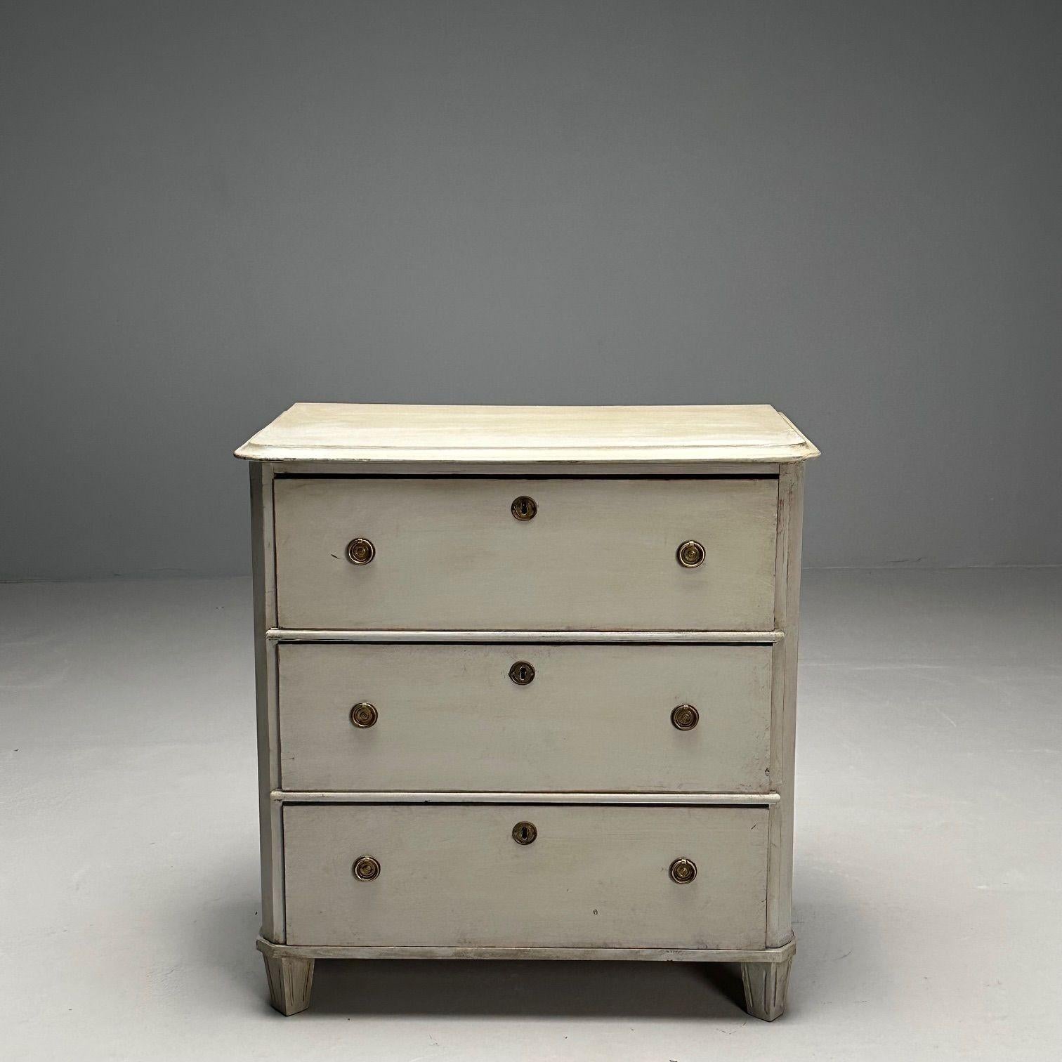 Gustavian, Swedish Commode, Grey Paint Distressed, Brass, Sweden, 1930s

Gustavian chest of drawers designed and produced in Sweden circa 1930s. This example features a gray paint distressed finish with rounded corners and three dovetailed drawers